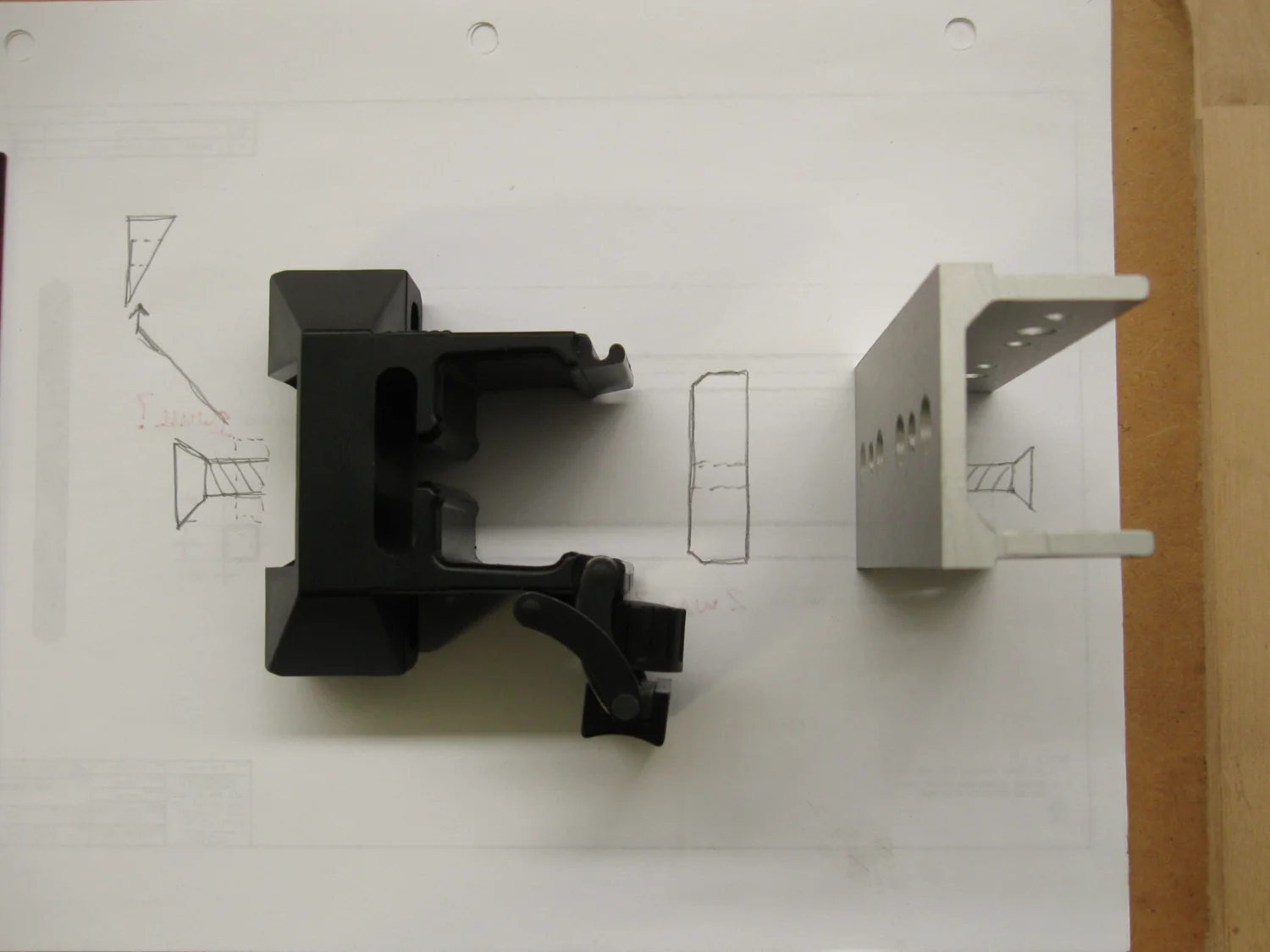 Sketching out the assembly of the lens mount slider.