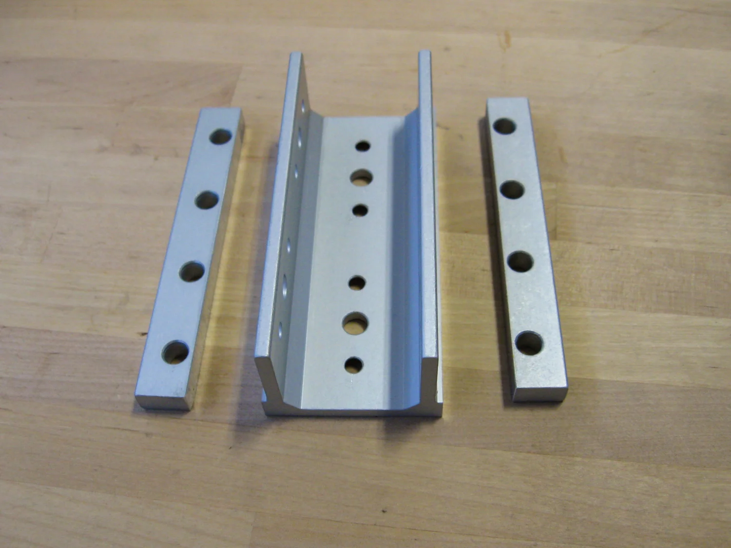 The 8020 fixture with its flanges cut off, prior to milling it to size