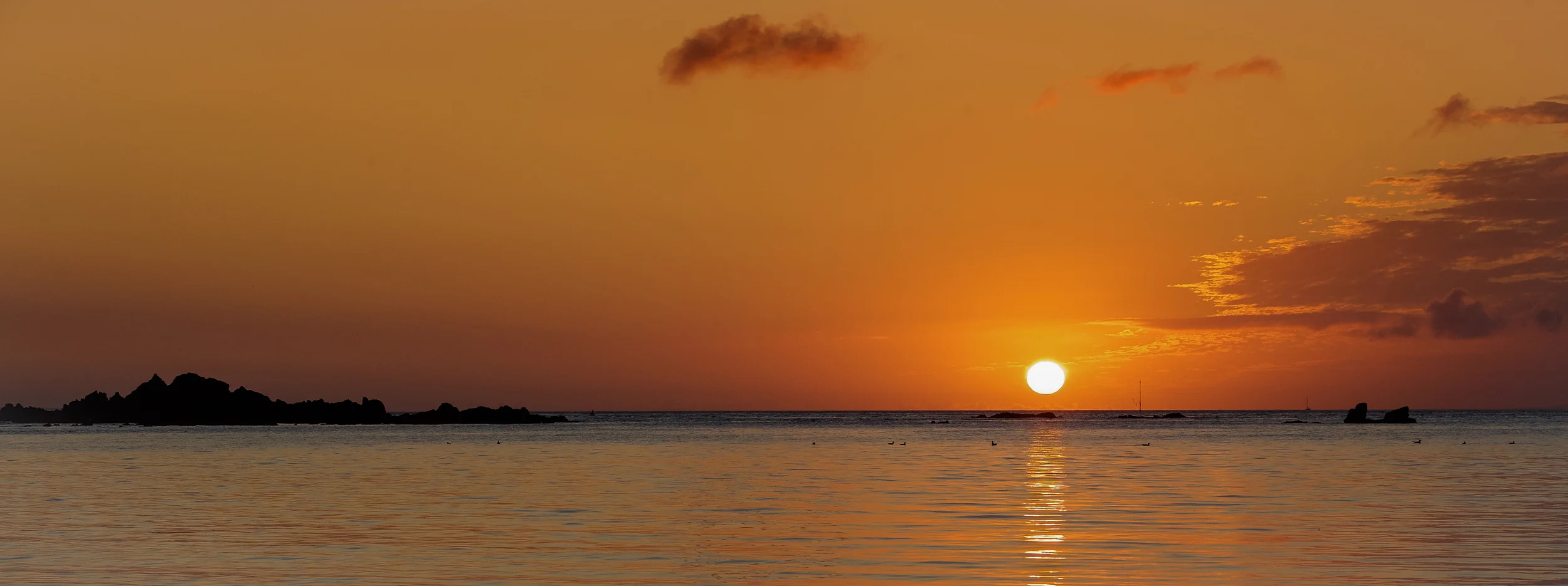 'A hint of Orange'... Early start to catch a beautiful Guernsey sunrise looking out from Bordeaux Harbour towards Alderney....