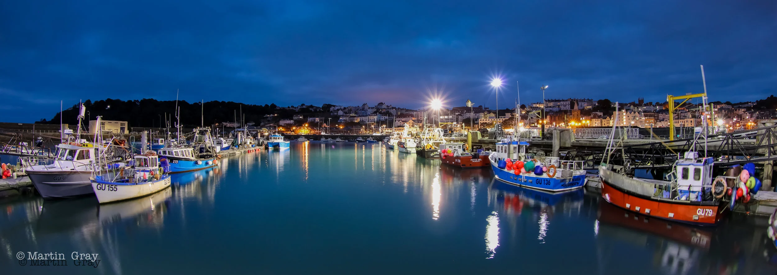 'Waiting for the Tide'... The Fisherman's Quay in St Peter Port Harbour....