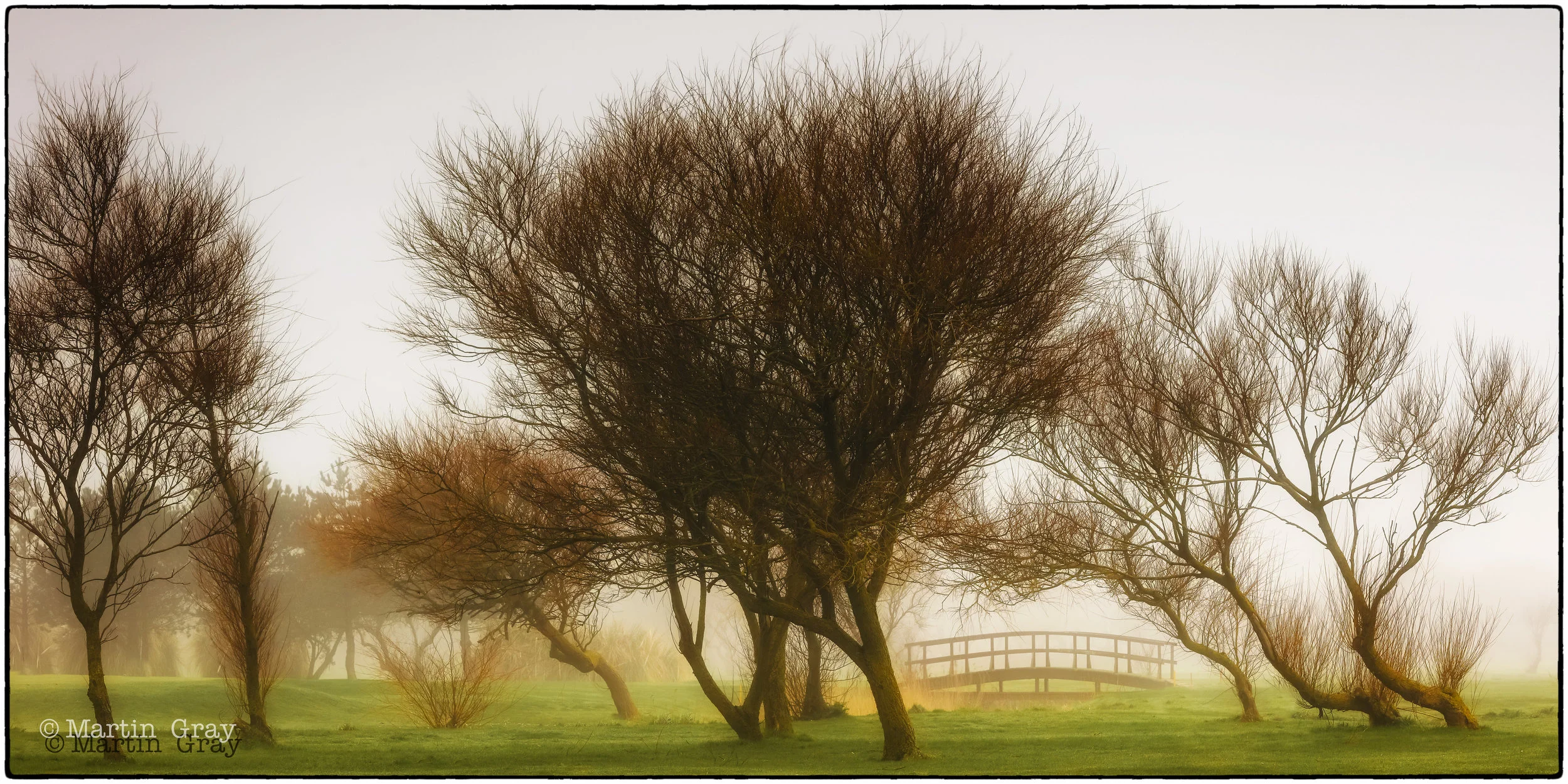 'Bridge to the First Green'... A misty scene at La Grande Mare Country Club...