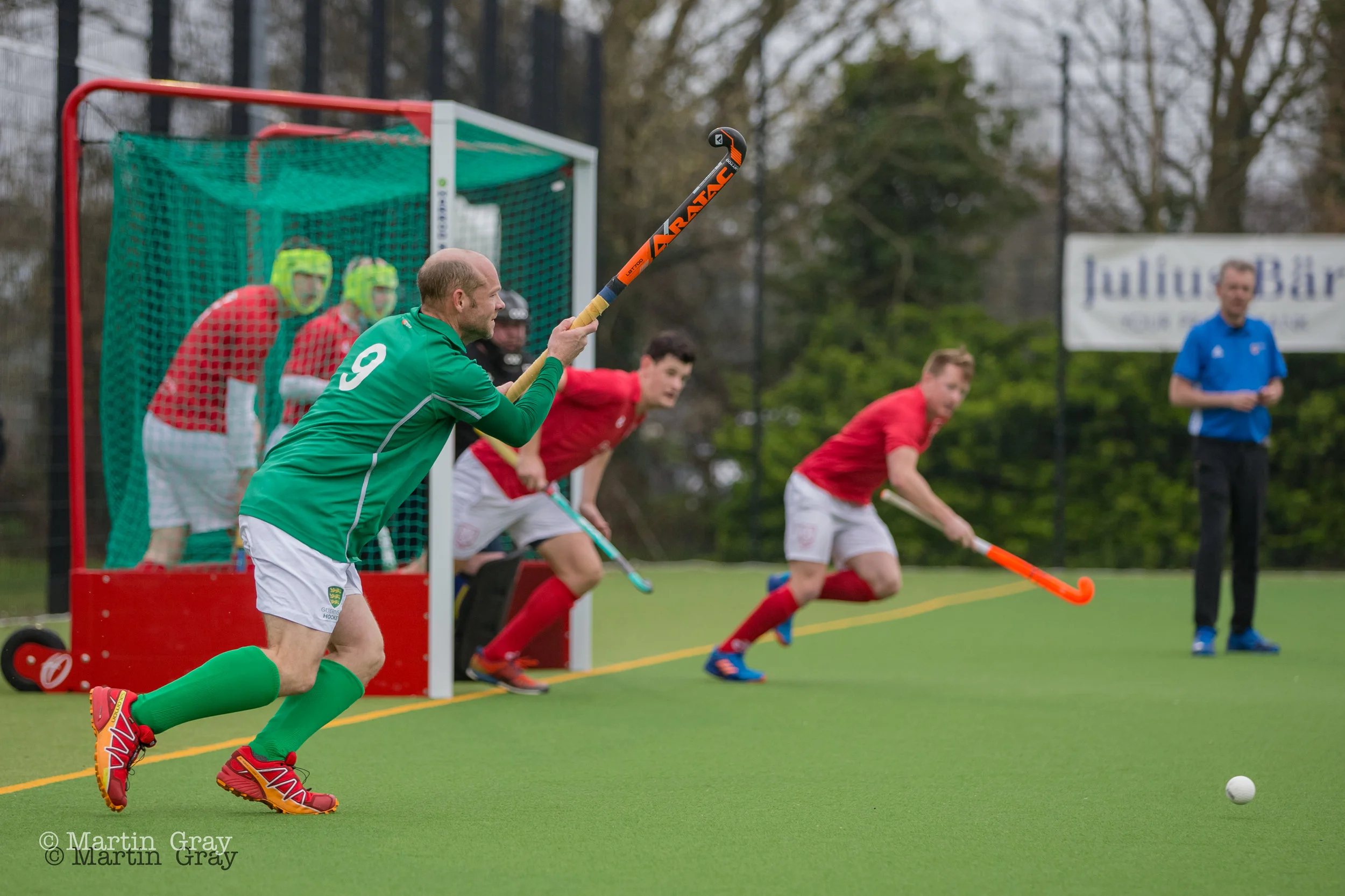 Steve Waldrom takes a short corner for Guernsey-4308.jpg