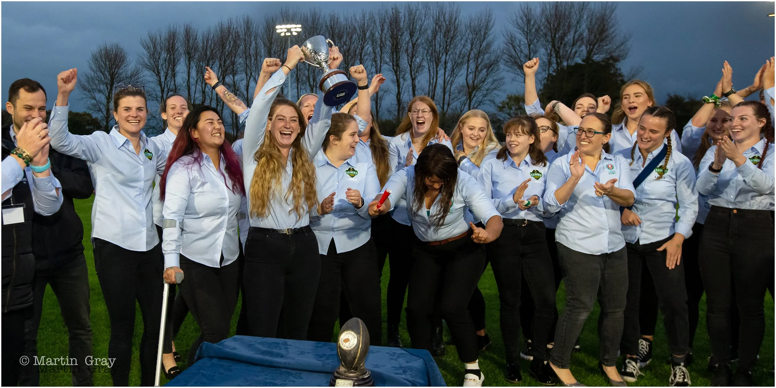 Raiders Kayleigh Oliver lifts the trophy-4643.jpg