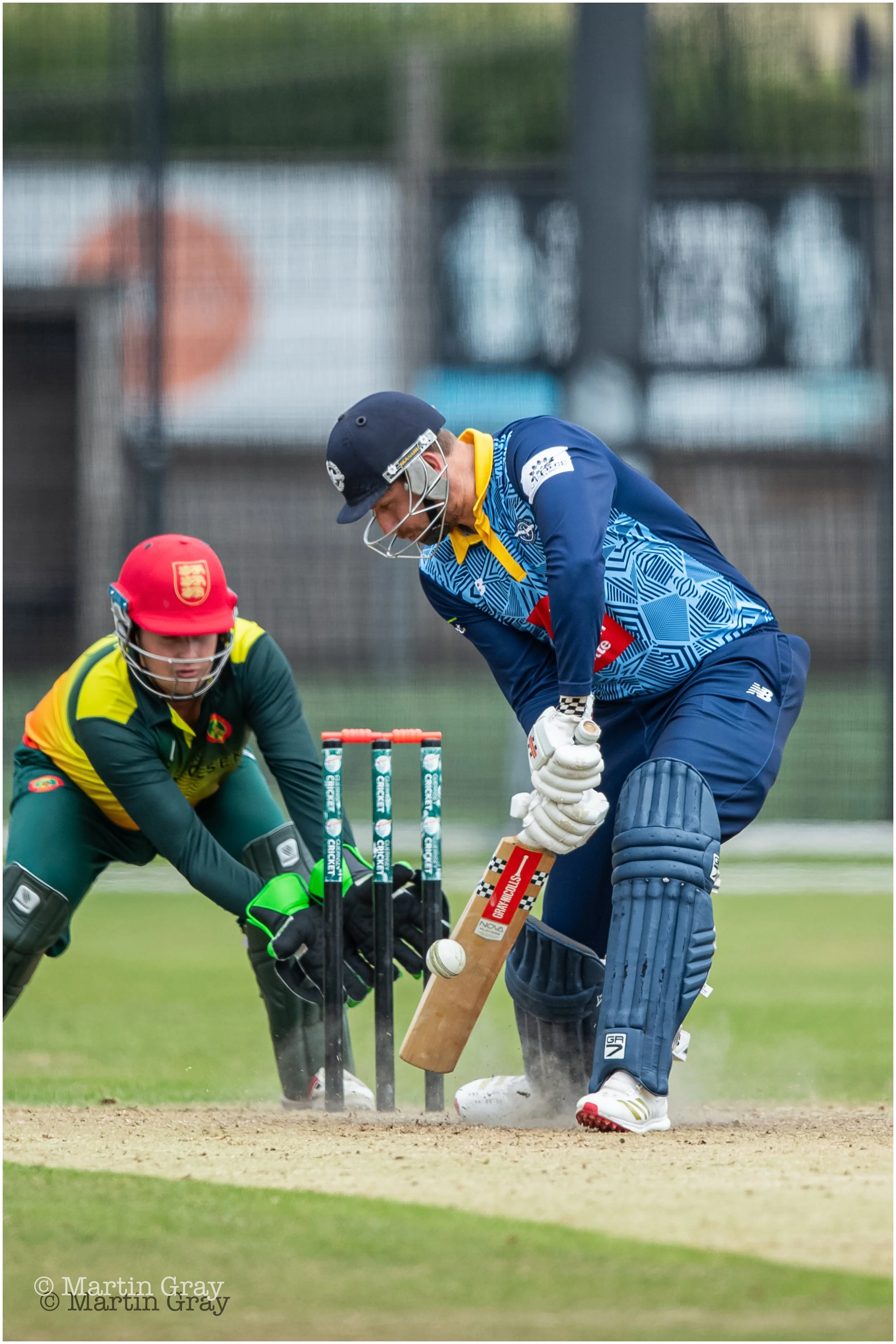 Ollie Newey digs out a yorker-9179.jpg