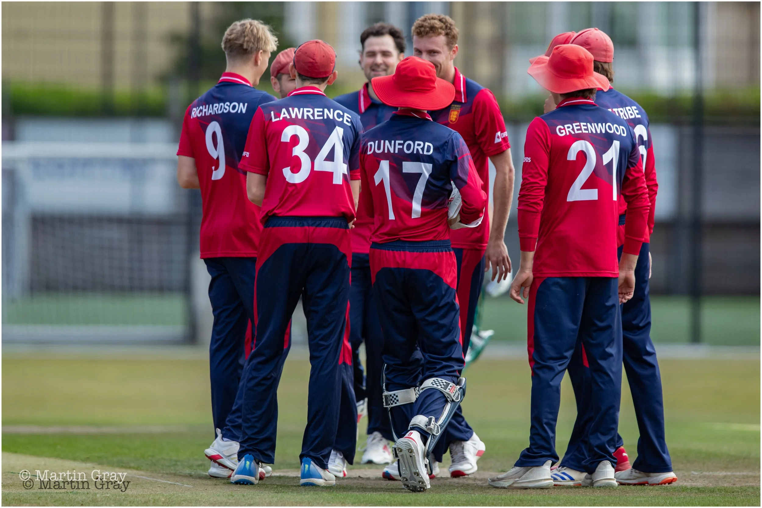 Jersey huddle at fall of wicket-1435.jpg