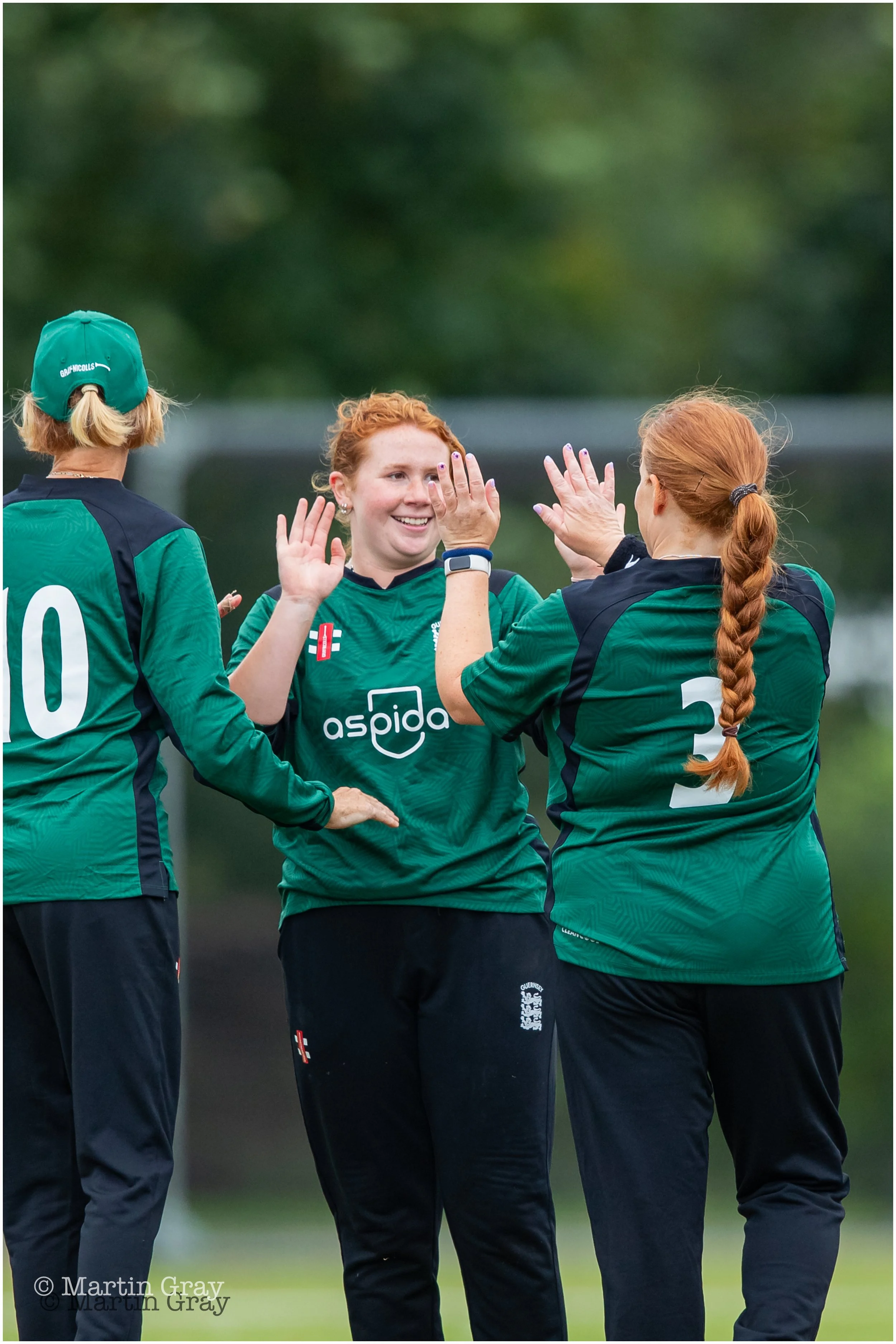 Amelia Wheatcroft is congratulated on bowling Isabella Peters-8253.jpg