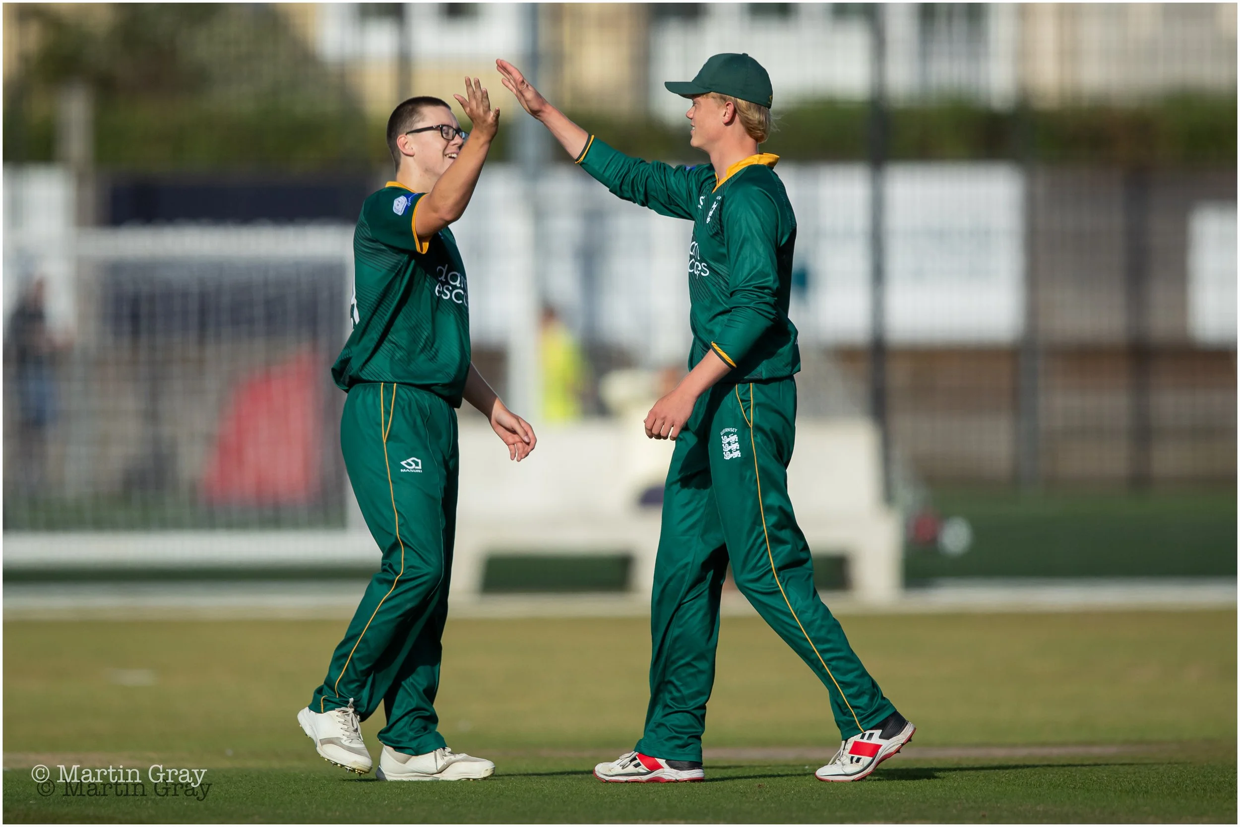 Alfie Gallienne and Ed Robinson celebrate the wicket of Asad Mahmood-0835.jpg