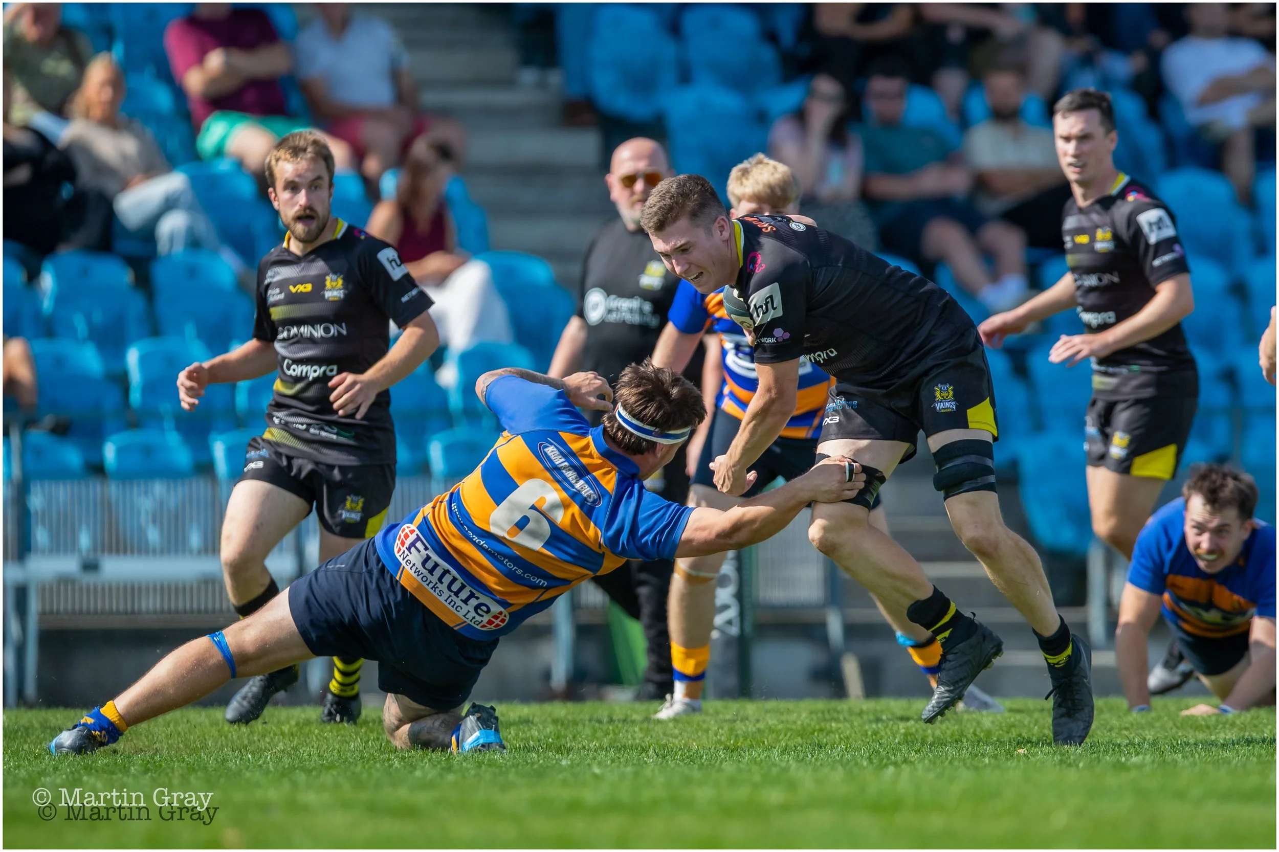 Luke Grigg runs into a tackle-5084.jpg