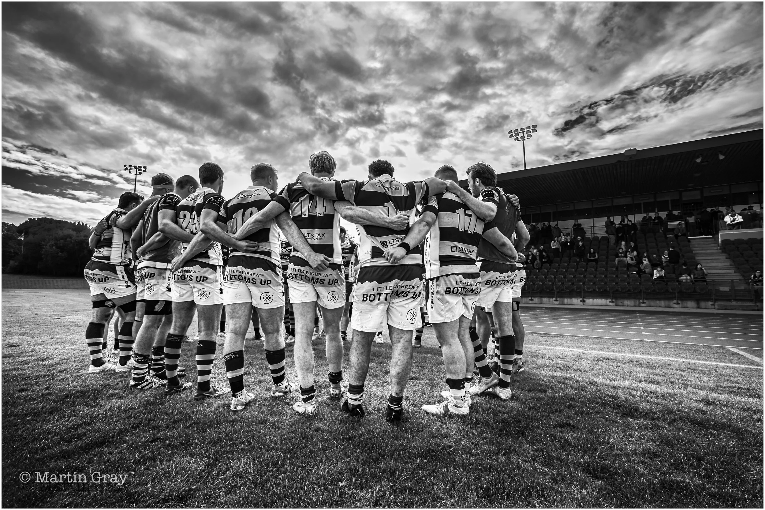 Raiders post match huddle B+W-2.jpg