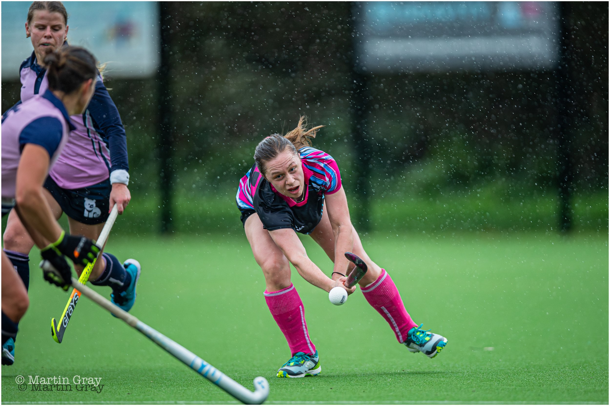 Emily McLaughlin powers a forward pass-0850.jpg
