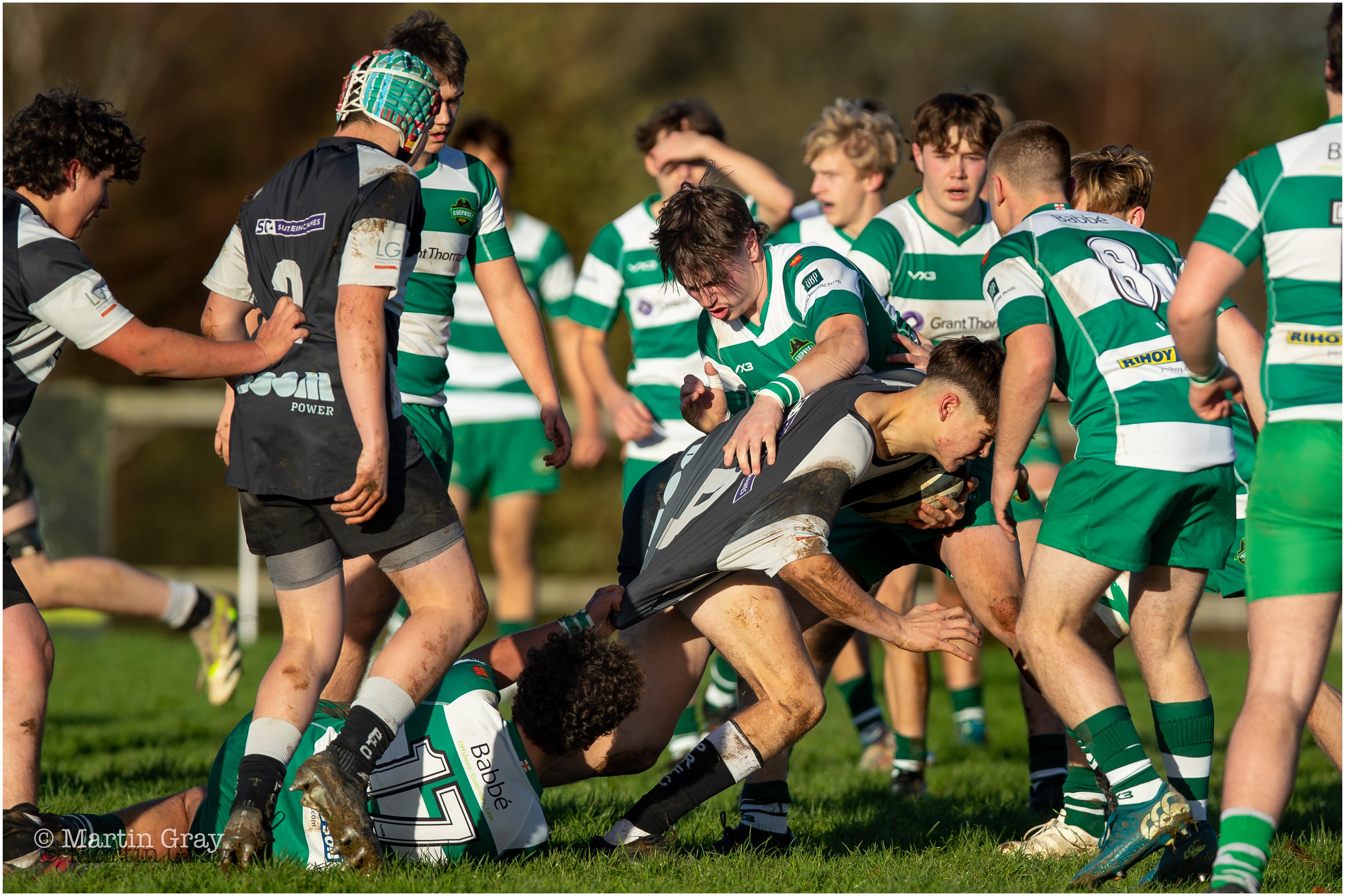 Jason Gaspar hold on to a tackle-1862.jpg