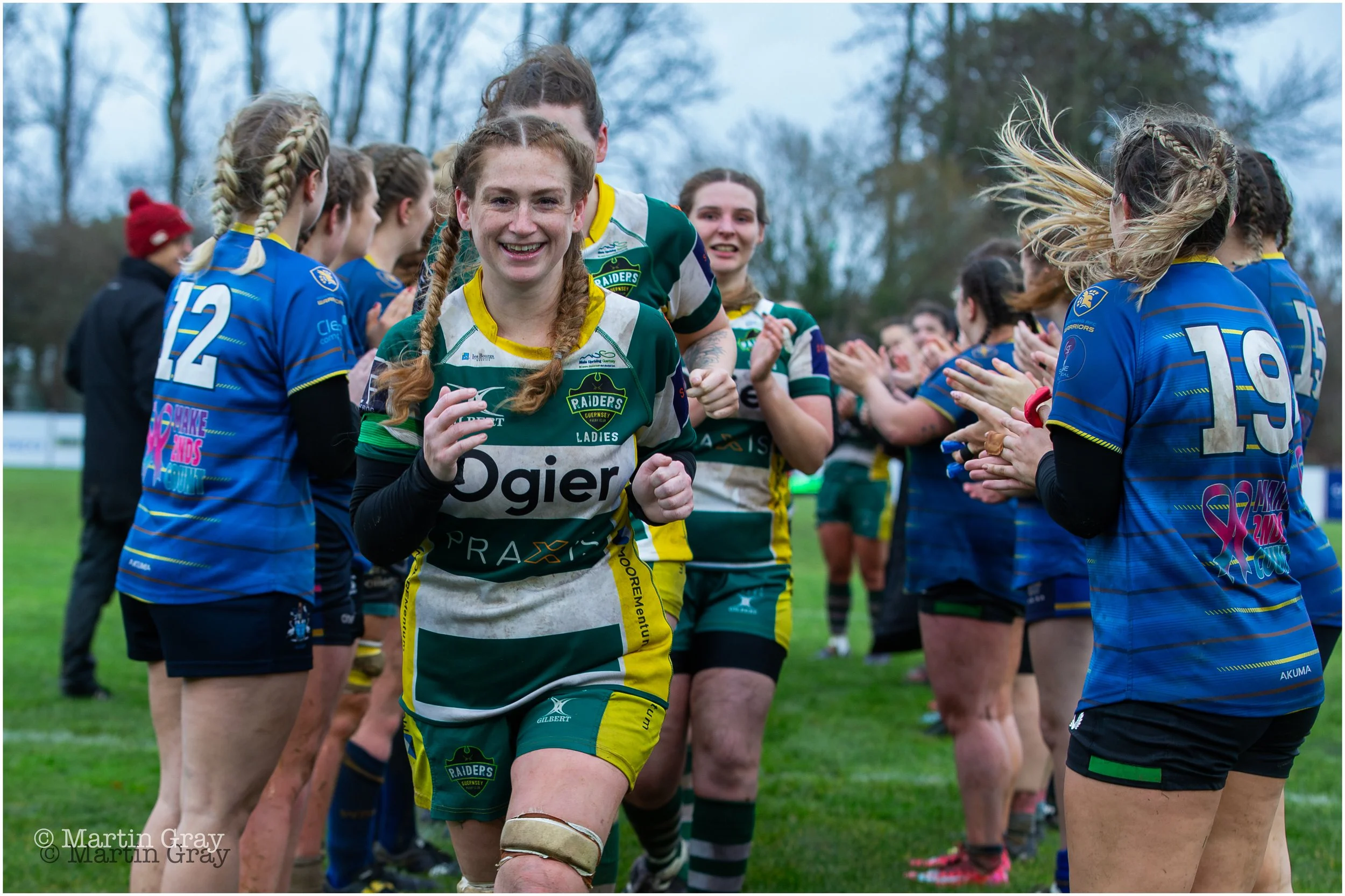 Kayleigh Oliver leads the victors throught he tunnel-7791.jpg