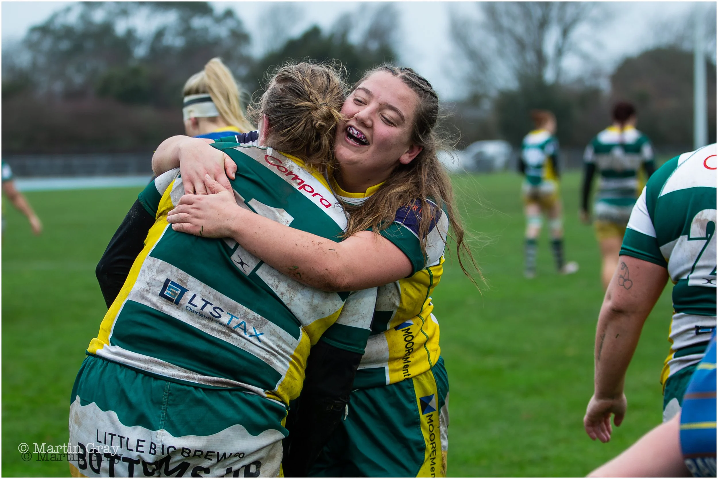Zoe Collins congratulates Tiegan Batiste on her first half Try-7361.jpg