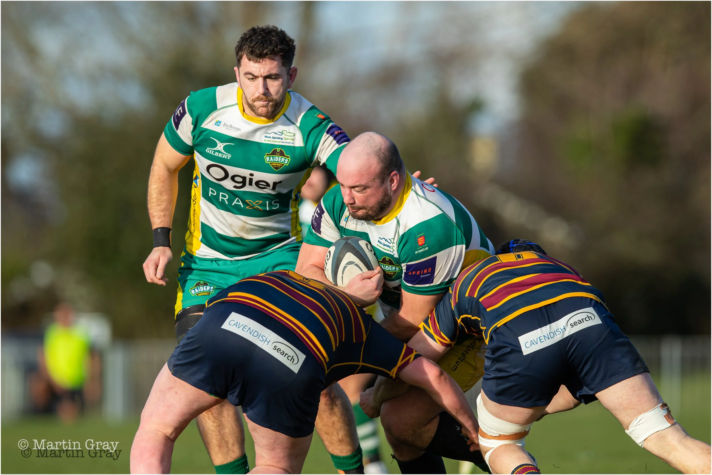 Sam Steventon carries the ball into a tackle-9227.jpg