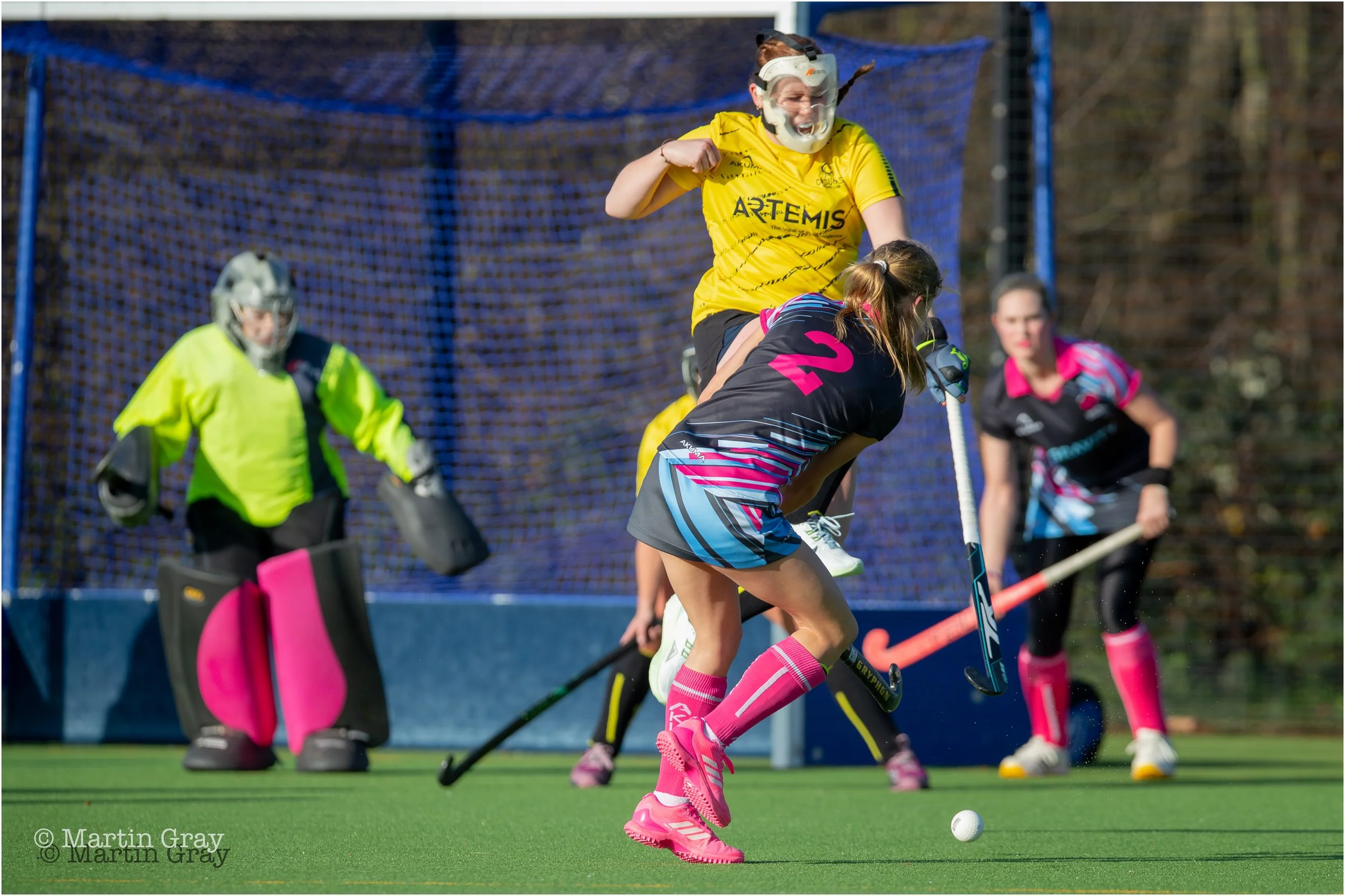 Claudia Bailey shoots as Amelia Wheatcroft avoids being hit-0640.jpg