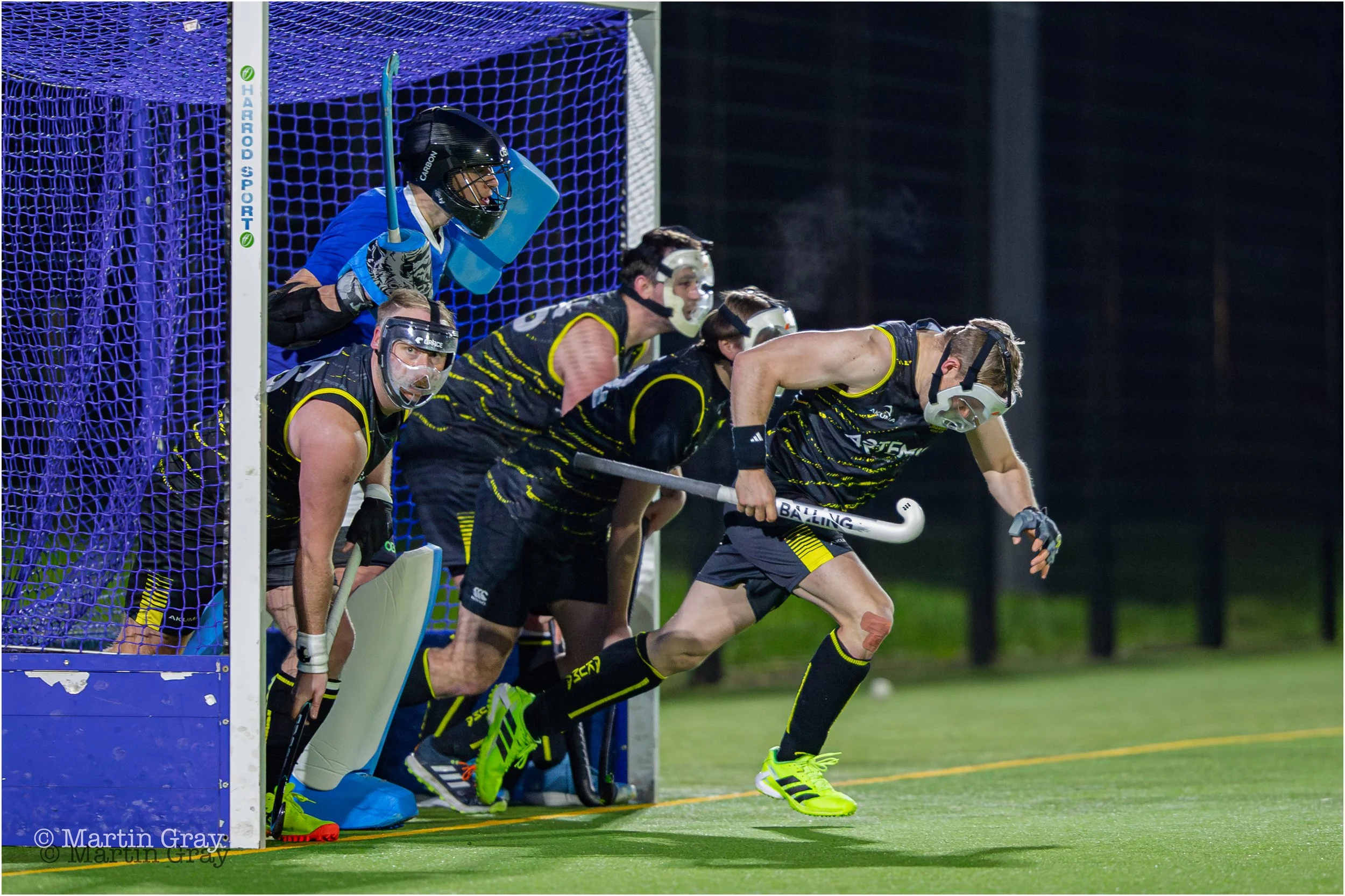 Casuals charge at a short corner-1533.jpg