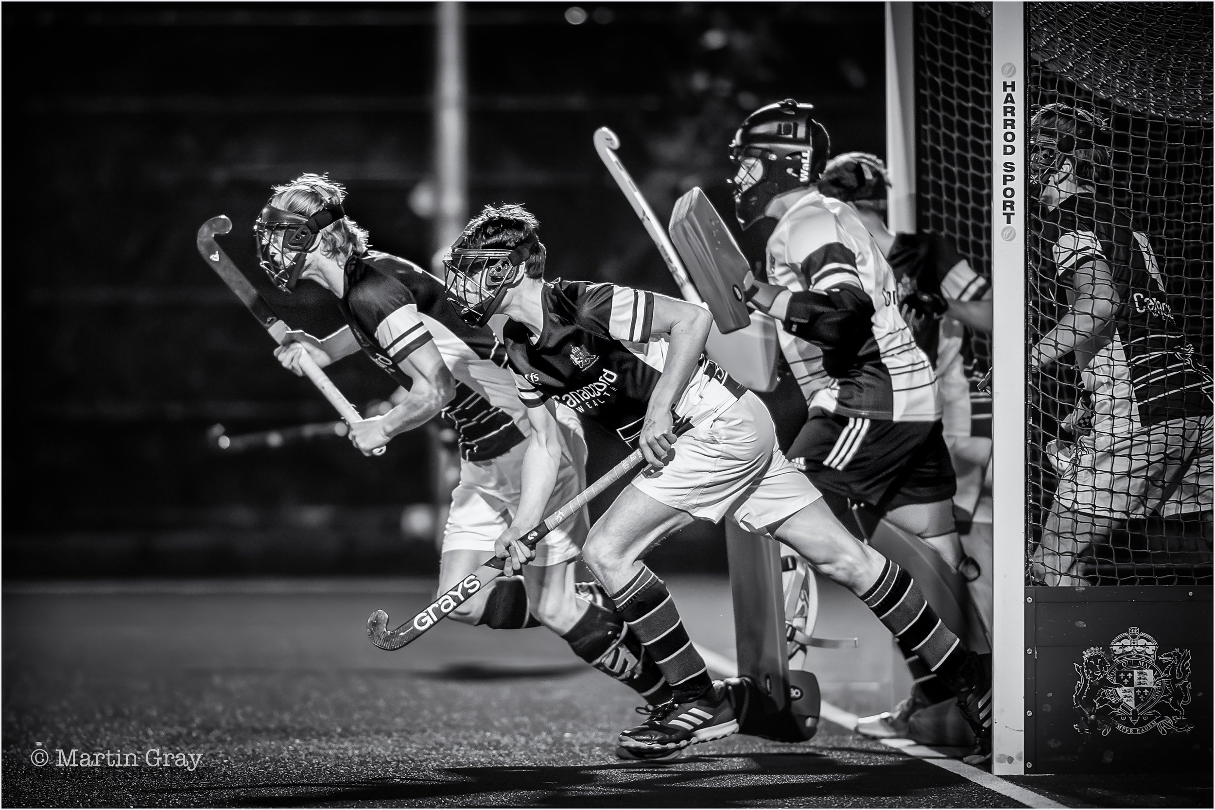 Elizabeth College charge a short corner B+W-2.jpg