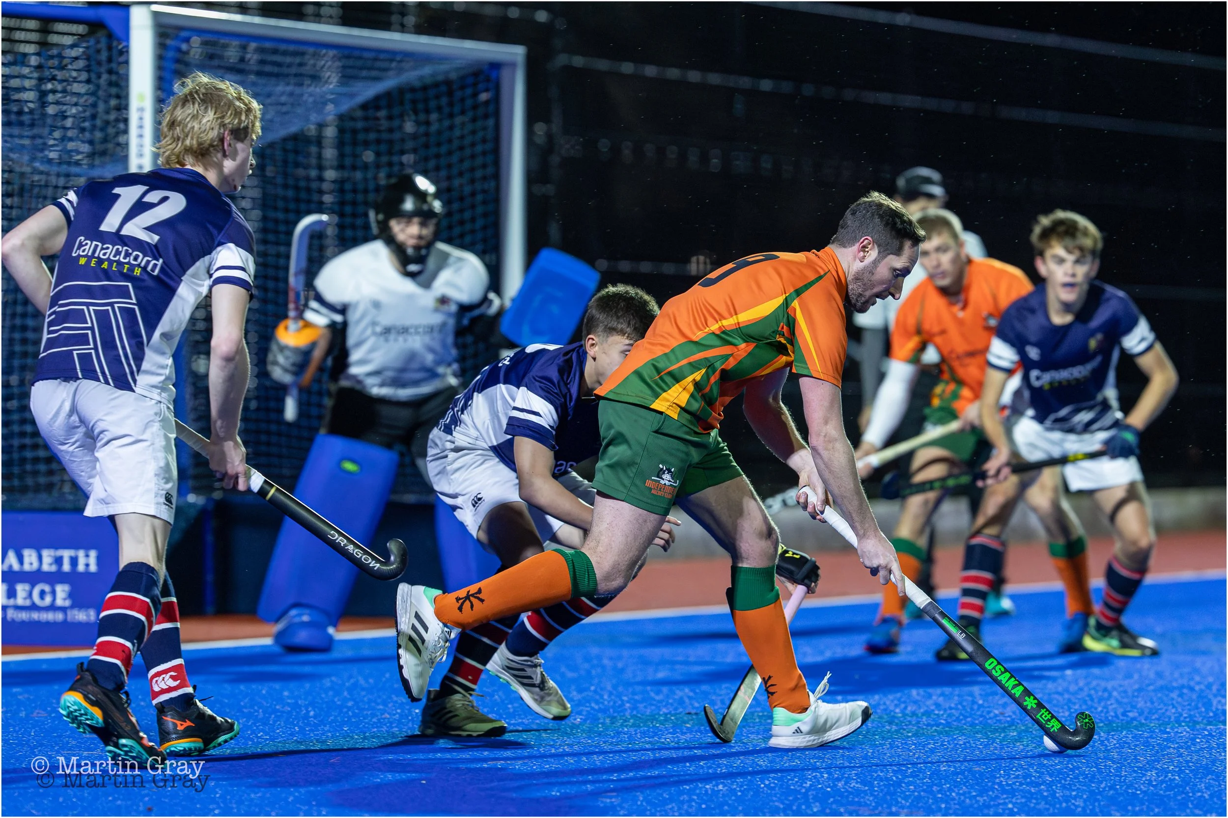 Josh Kendal attacks the College goal-1887.jpg