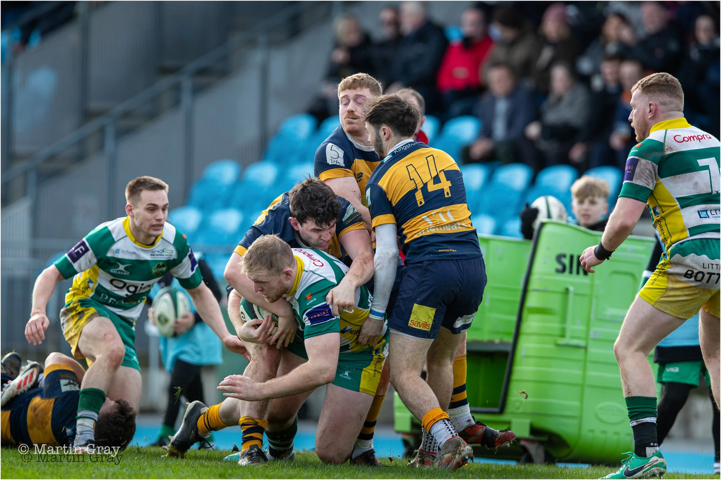 Ciaran McGann is tackled on the touchline-9979.jpg