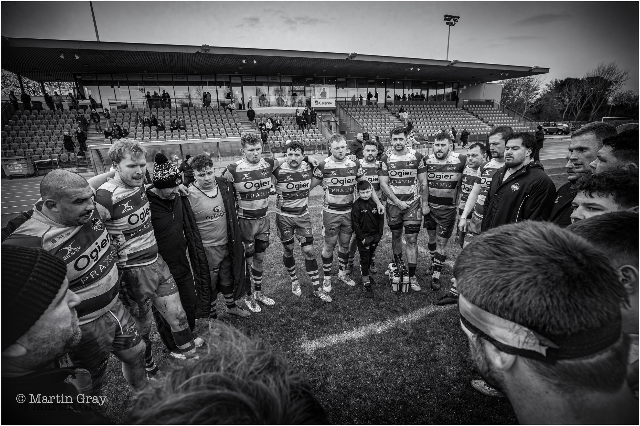 Raiders post match huddle B+W-2.jpg