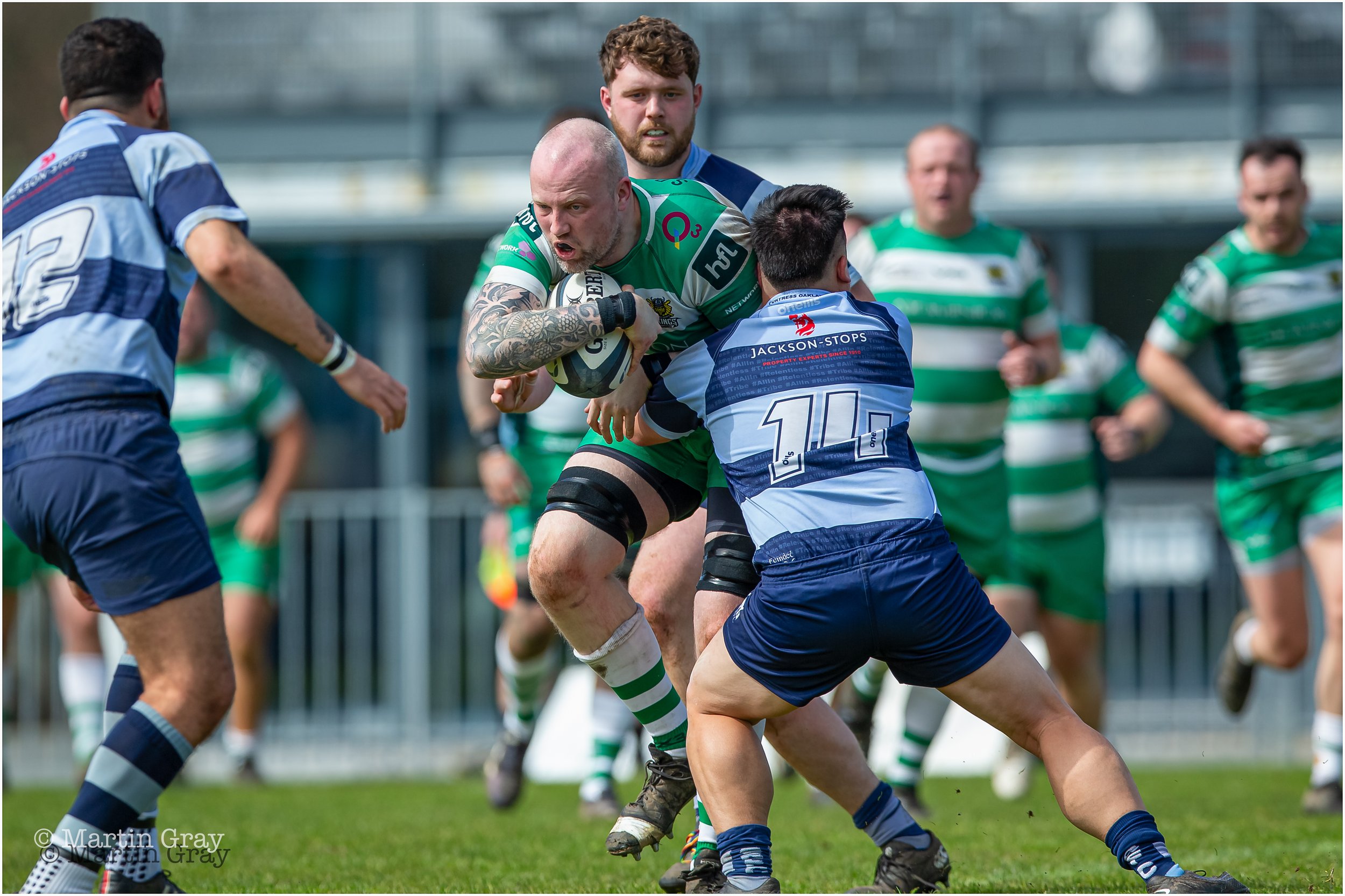 Angus MacCallum punching through a tackle-1331.jpg