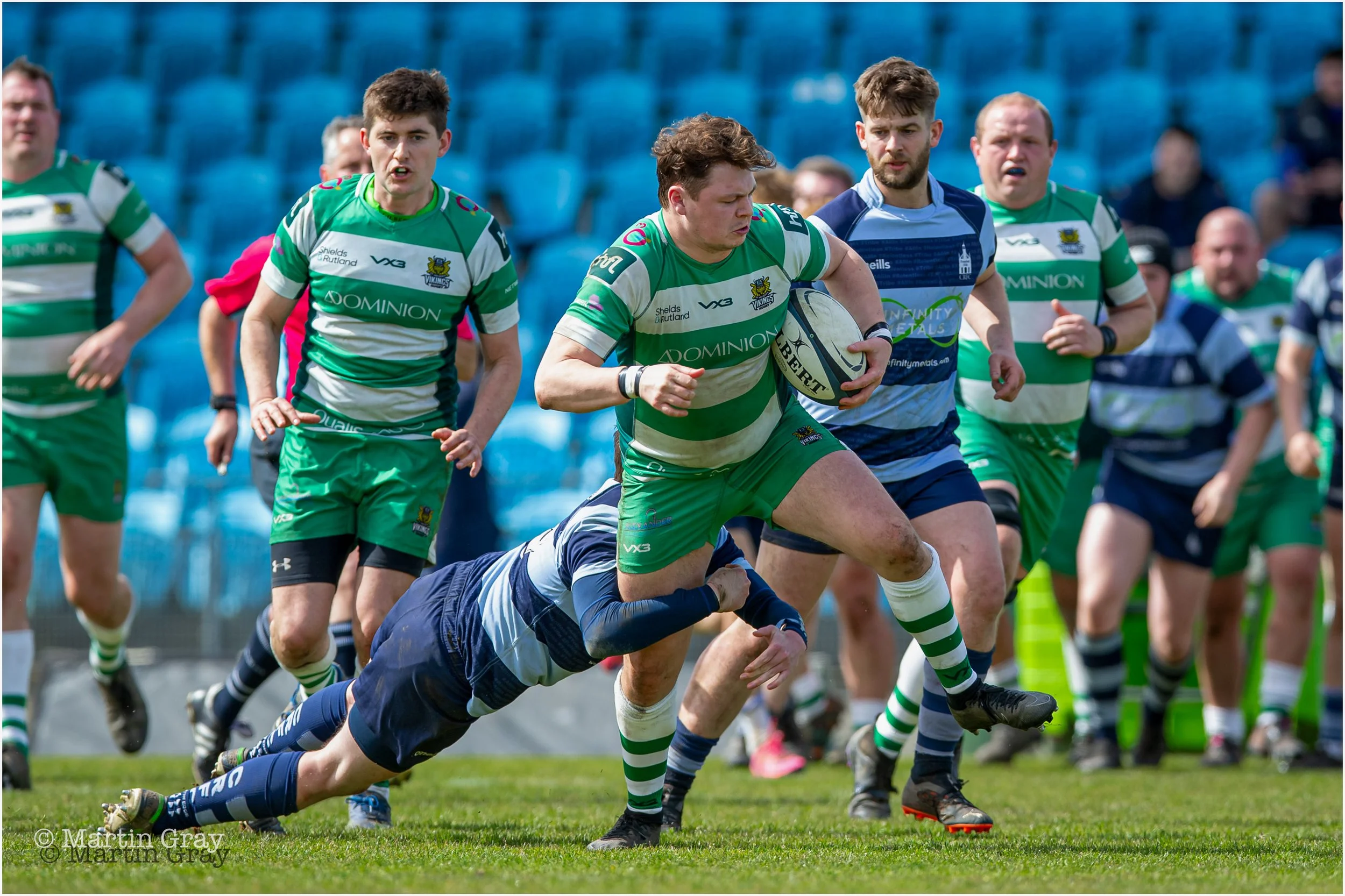 Ed Duerden tries to slip a tackle-1709.jpg