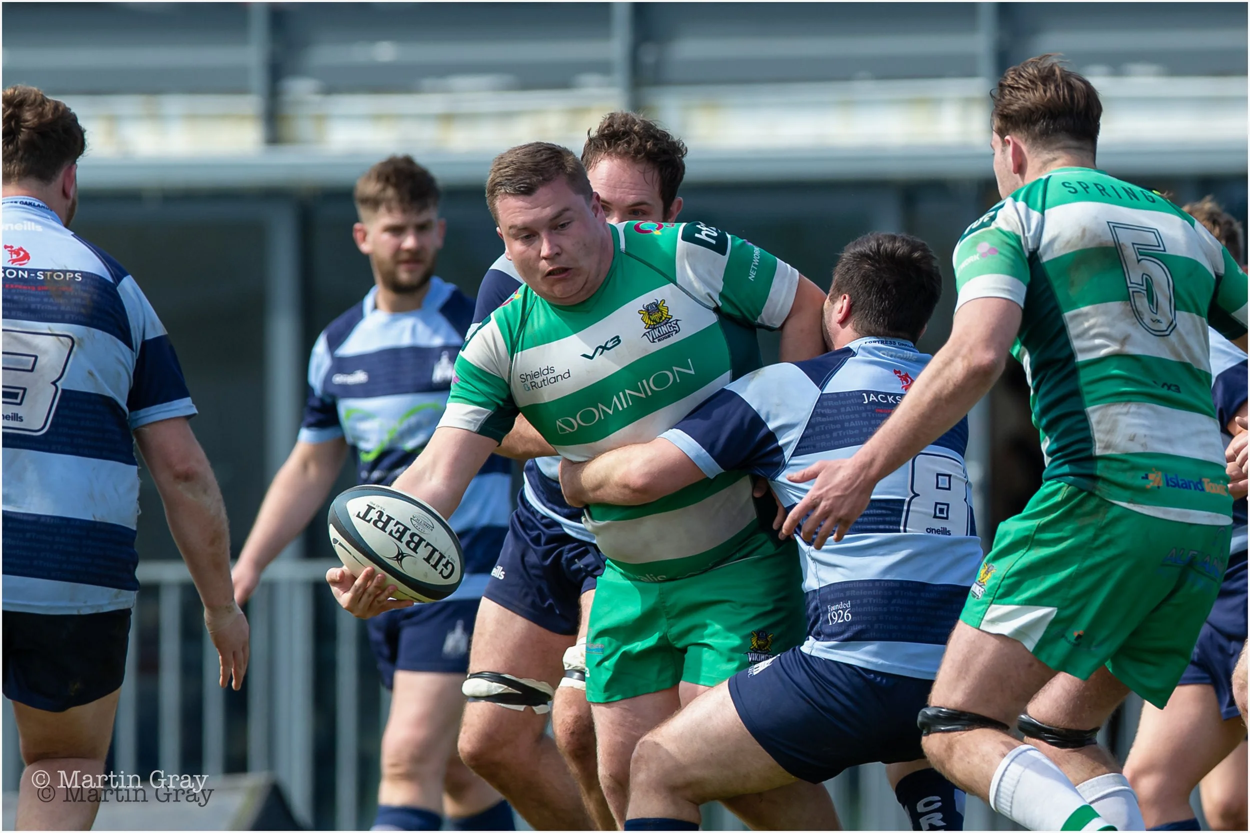 Tom Bray looks to offload a pass under tackle-1481.jpg