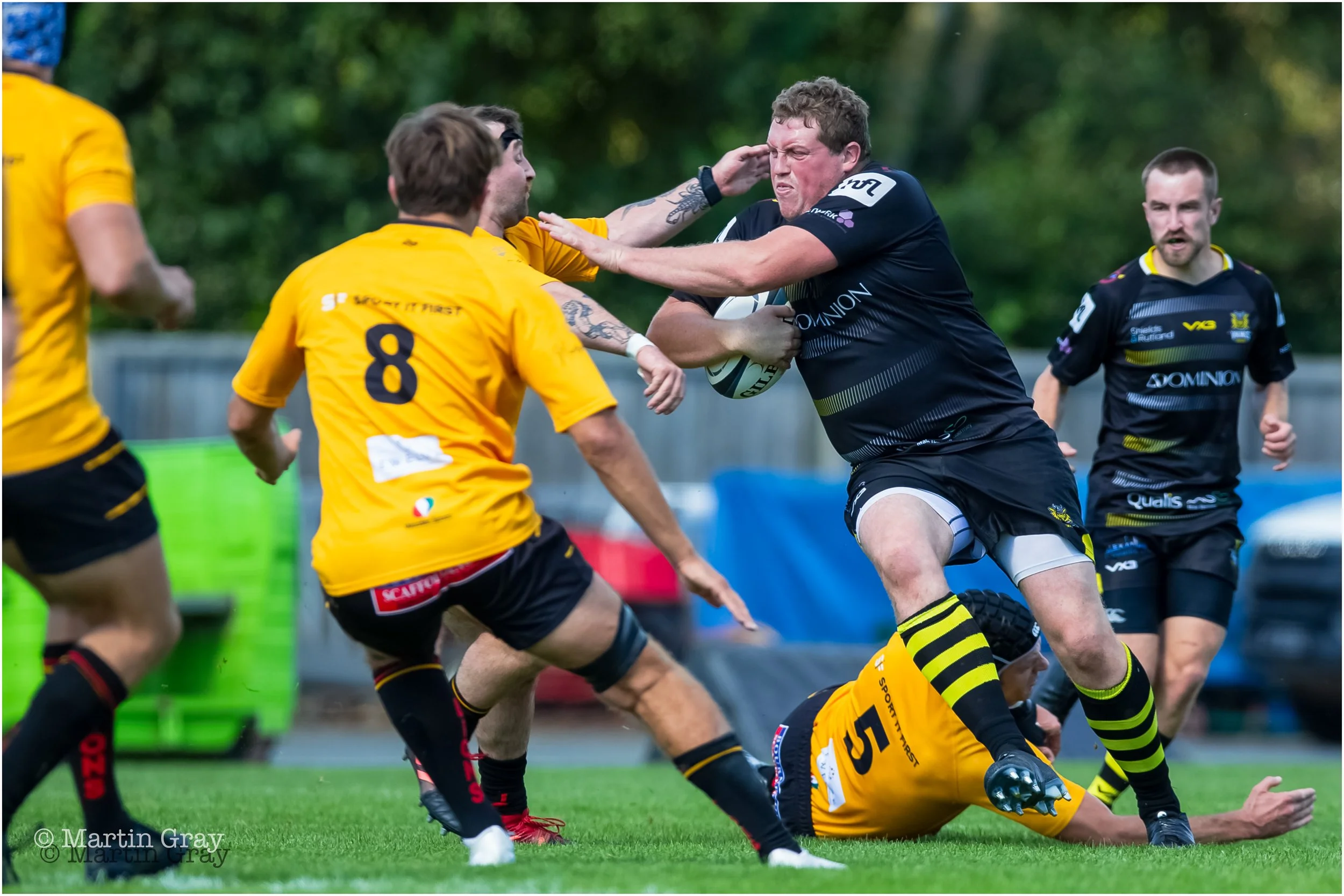 Jacob Smith hands off a tackle-2798.jpg