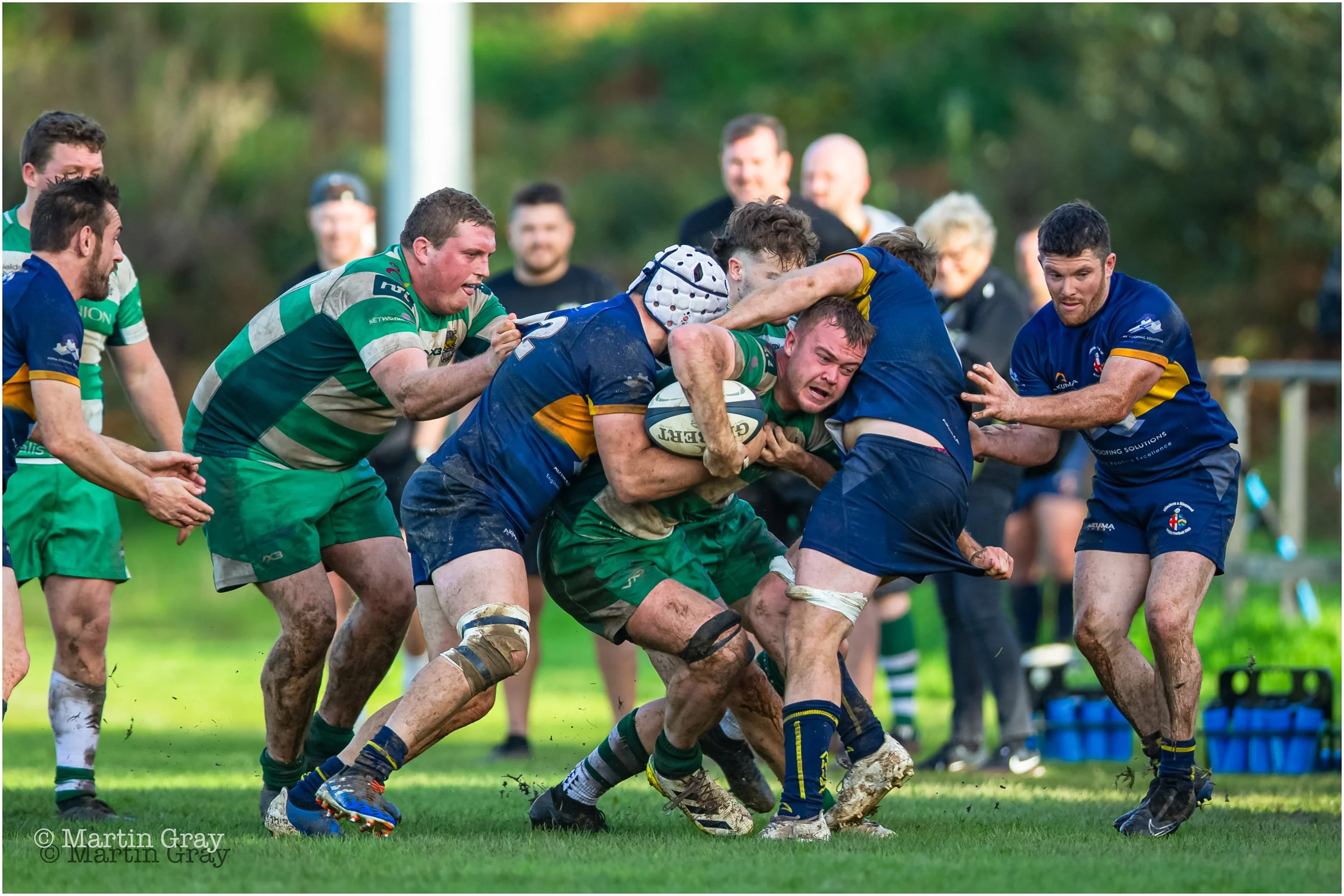 Tom Yarwood is surrounded on the touchline-2403.jpg
