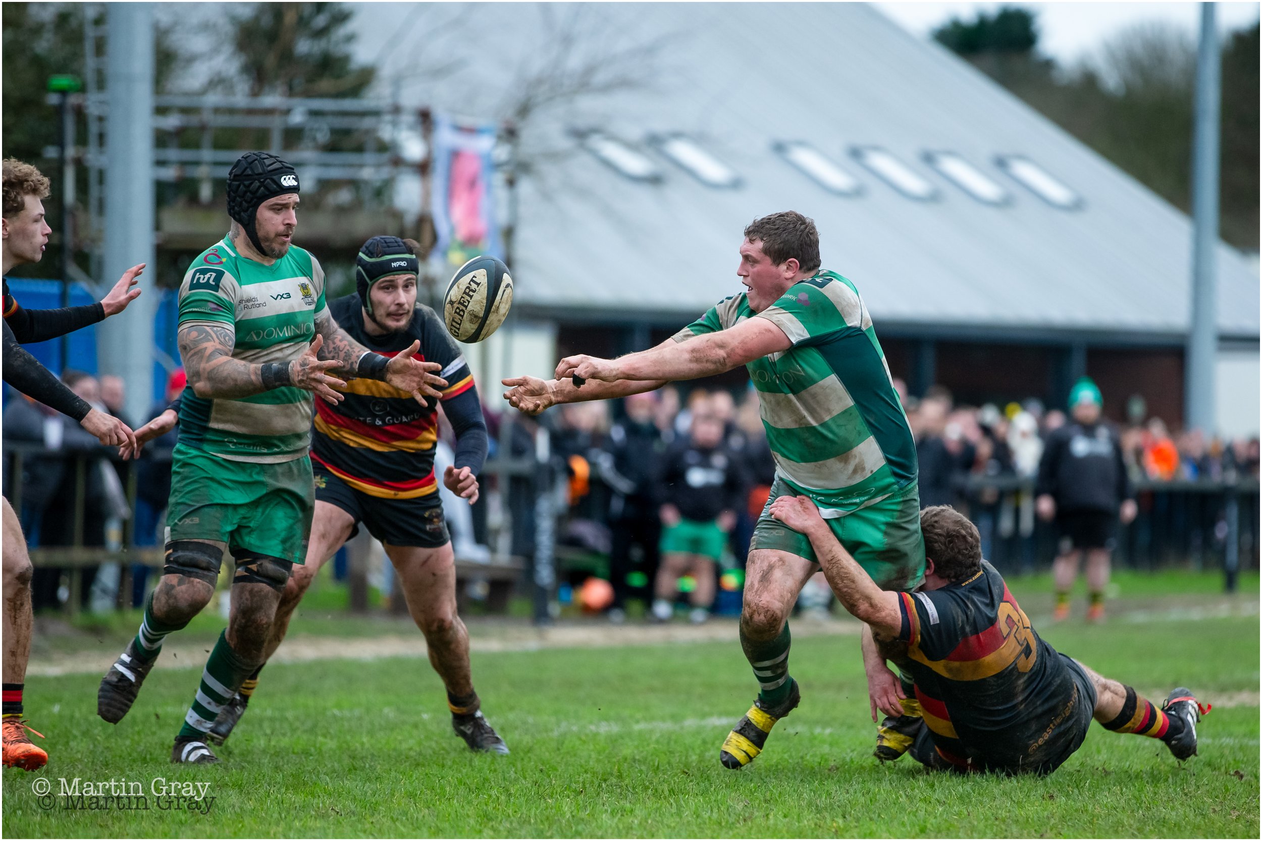 Jacob Smith offloads a pass to Tom Creed-2.jpg