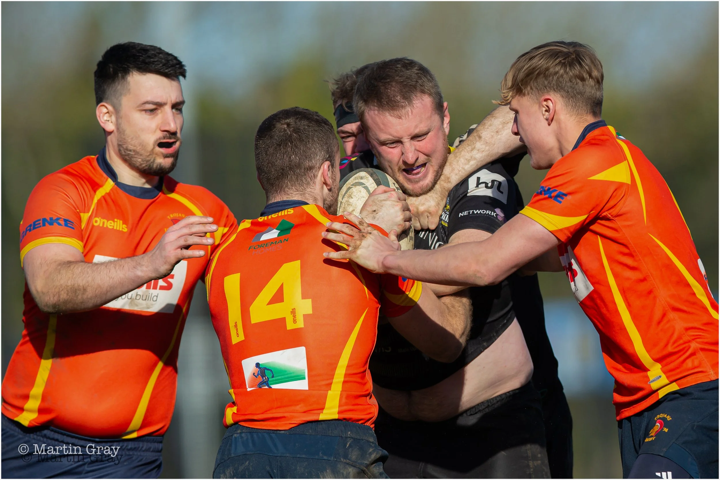 Callum Gladstone is wrapped up in a tackle-1357.jpg