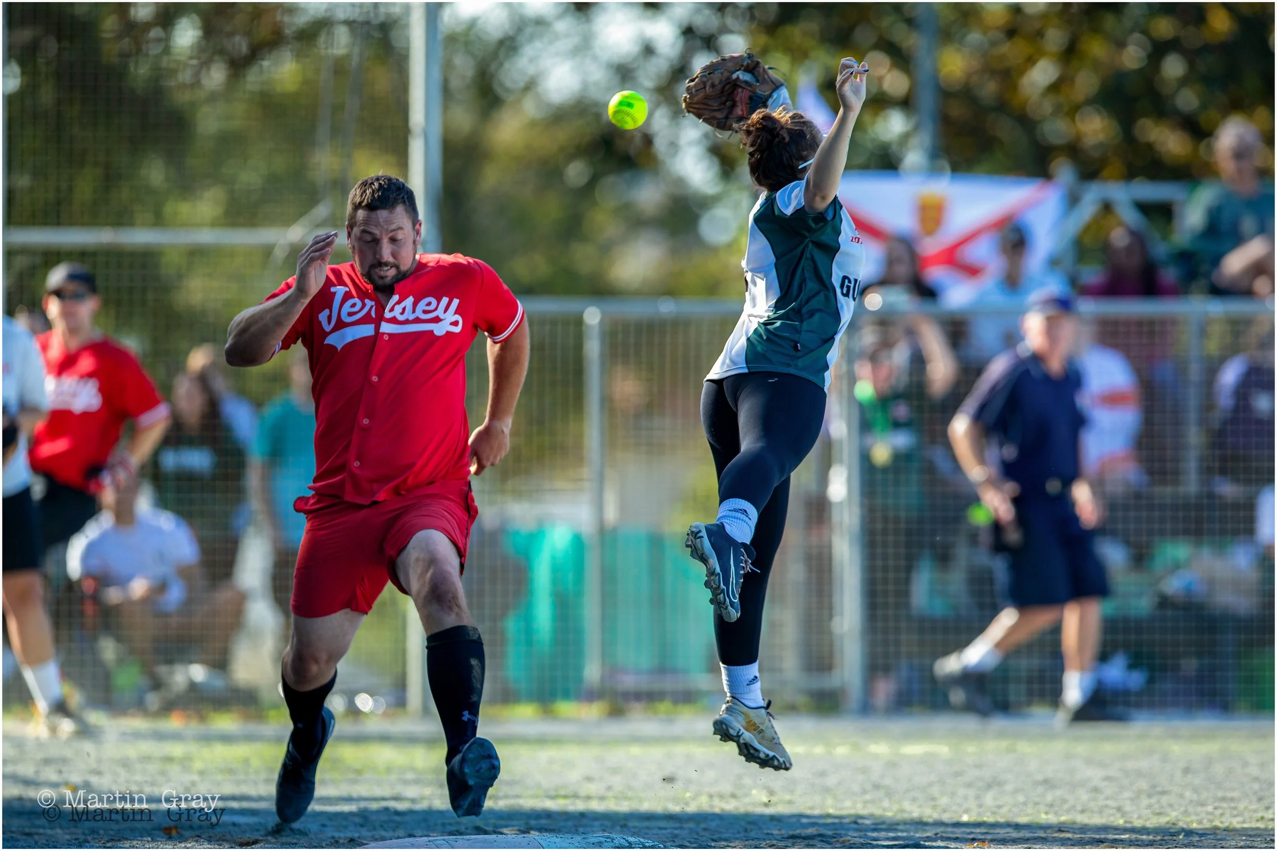 Macy Cortez attemps to catch a return to first-6038.jpg