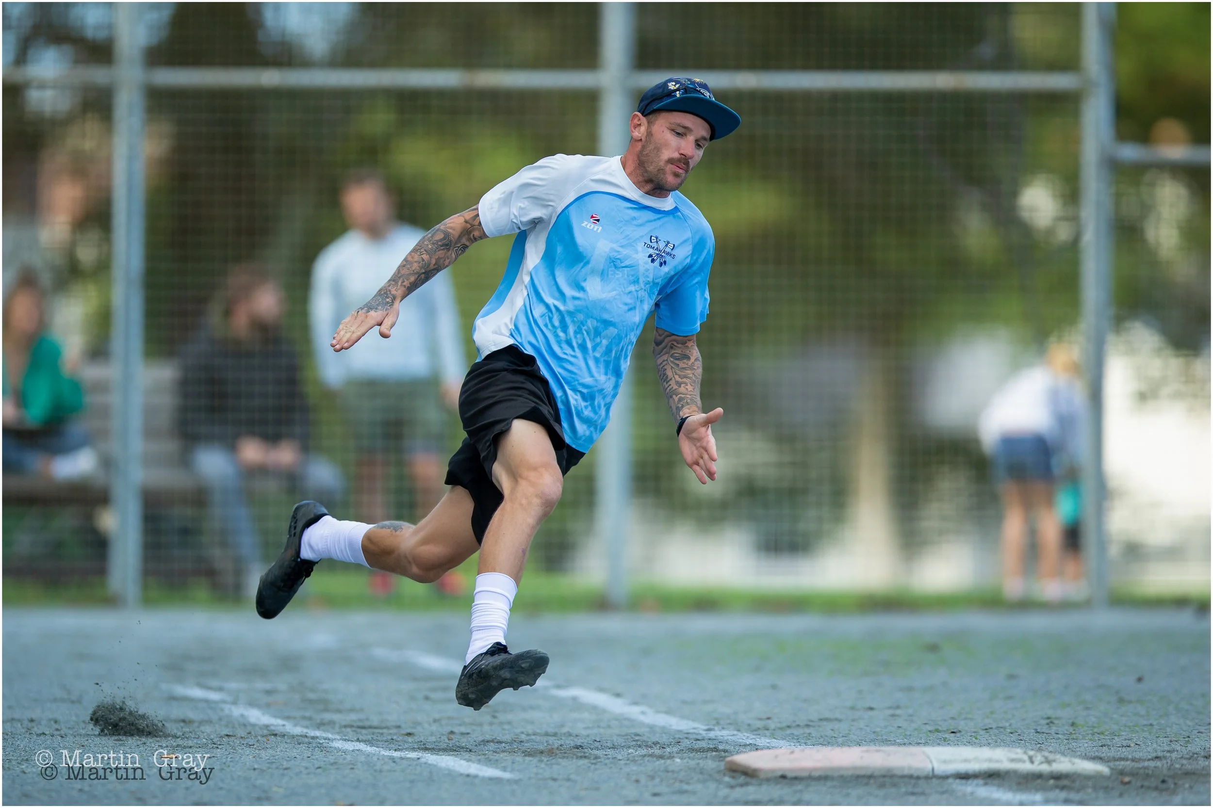 Shane Taylor rounds first base on a home run-4624.jpg