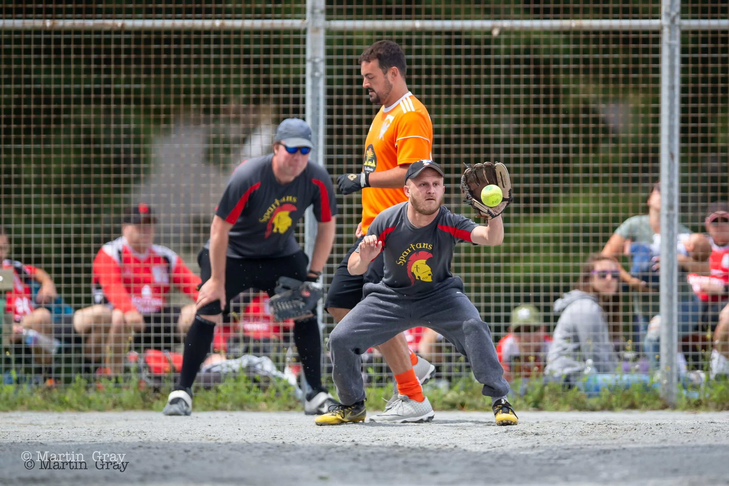 Matt Kershaw crosses home base as Martin Petit takes the ball-7997.jpg