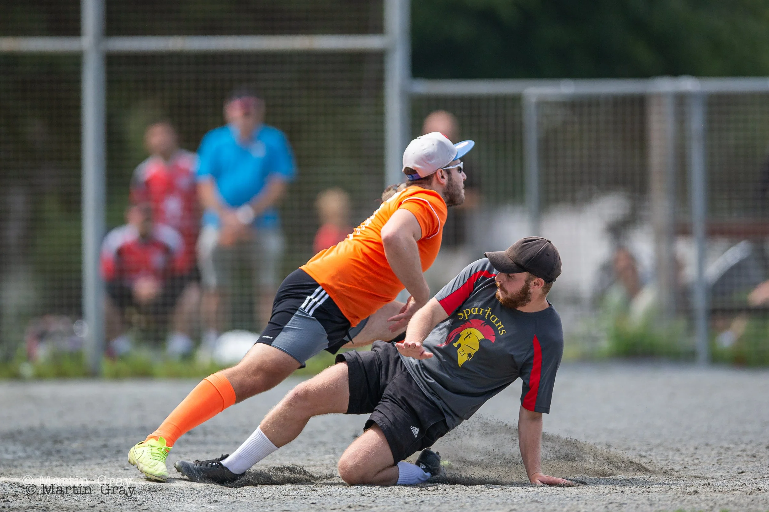 Sam Downs slides in to first base with baseman Oli Brehaut-8294.jpg