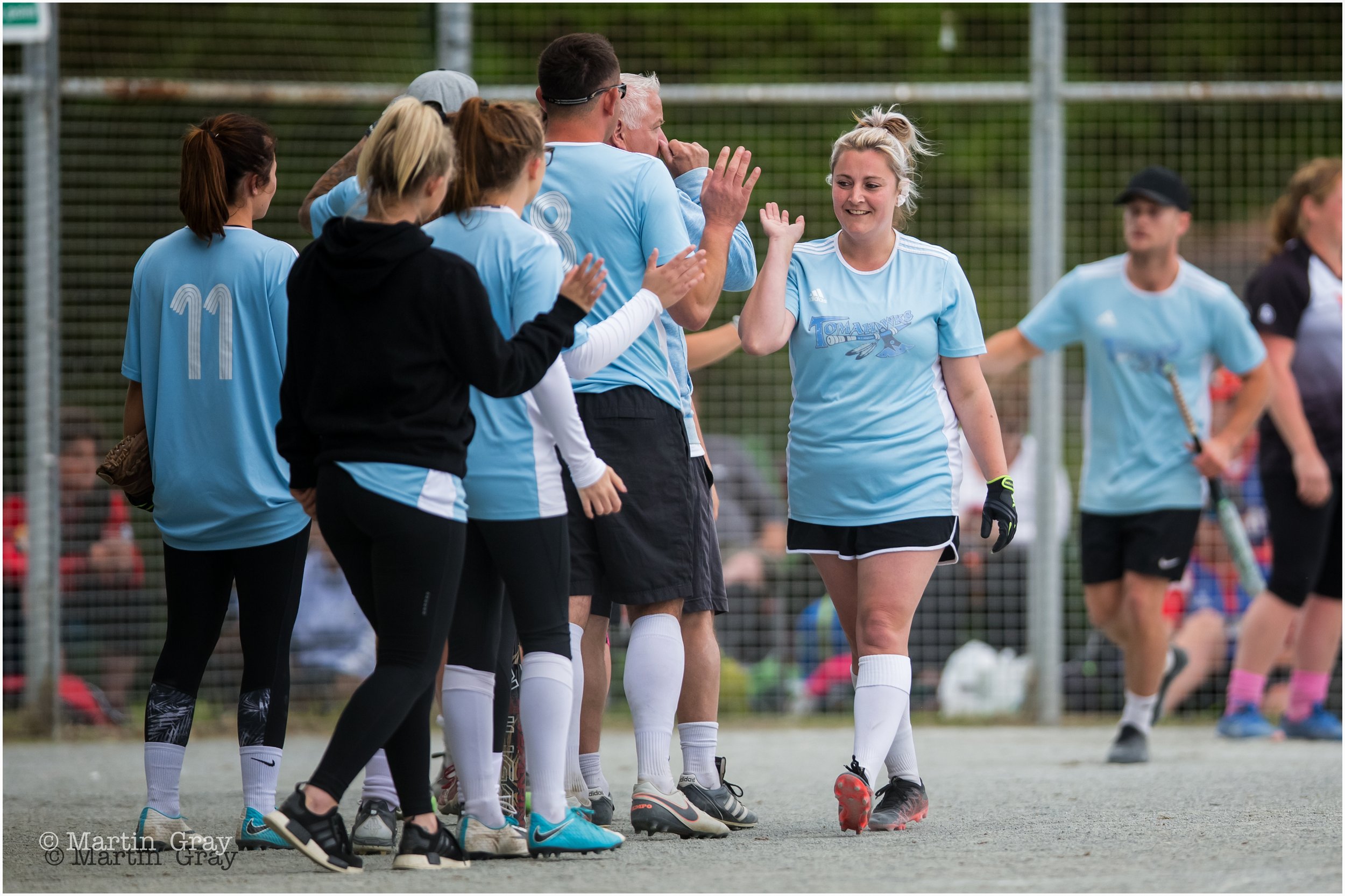 Danni Young celebrates ahome run-4421.jpg
