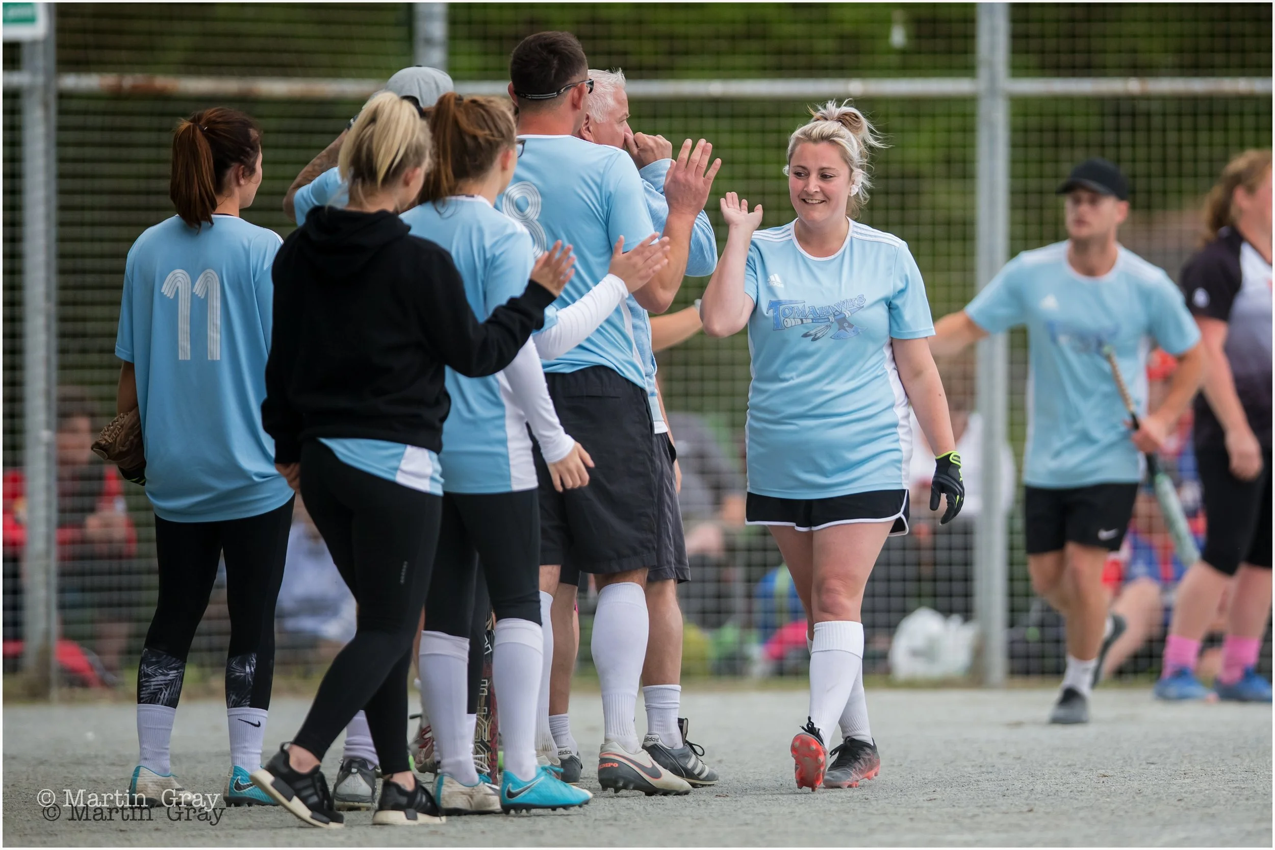 Danni Young celebrates ahome run-4421.jpg