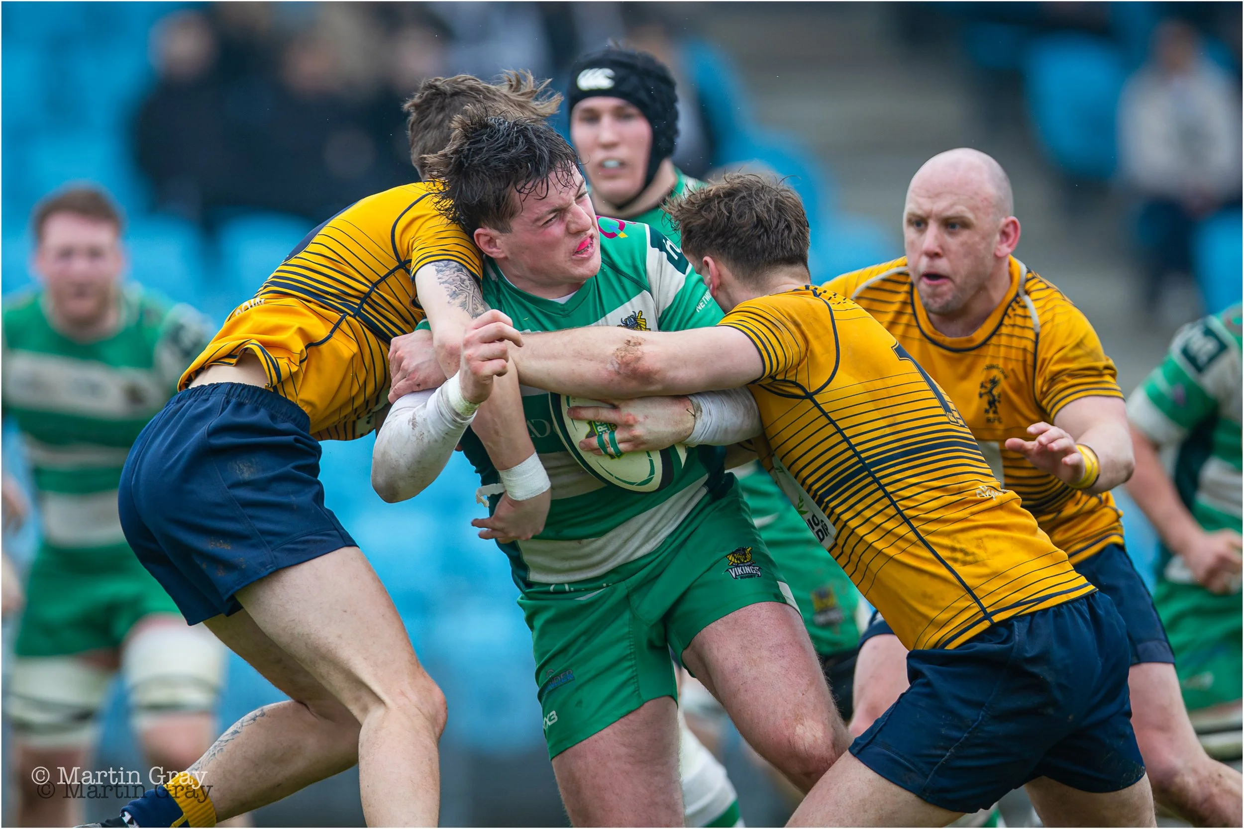 Niall McGann feels the pain of a strong Basingstoke tackle-5092.jpg