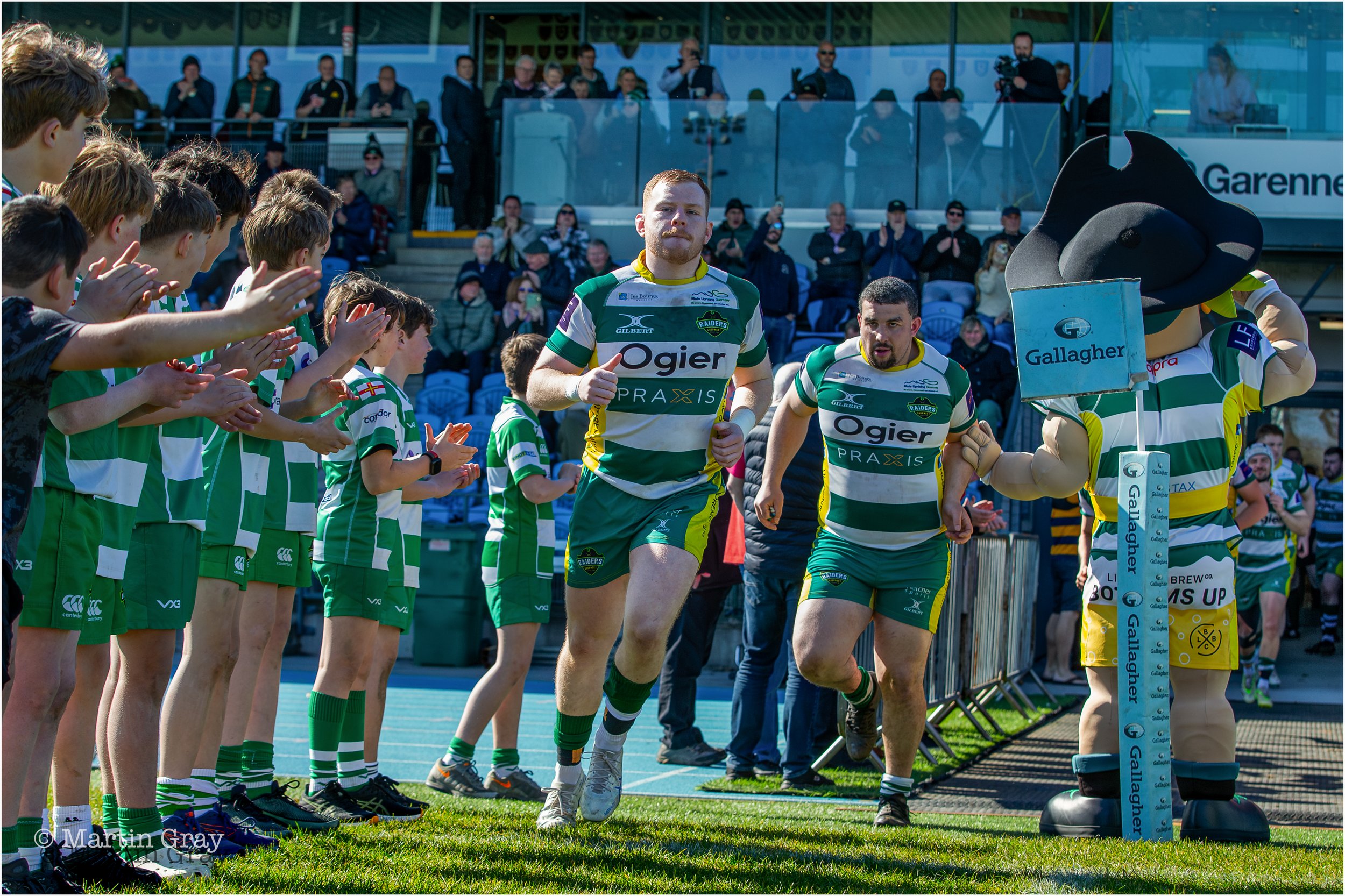 Dom Rice leads out he Raiders with Academy support-3902.jpg