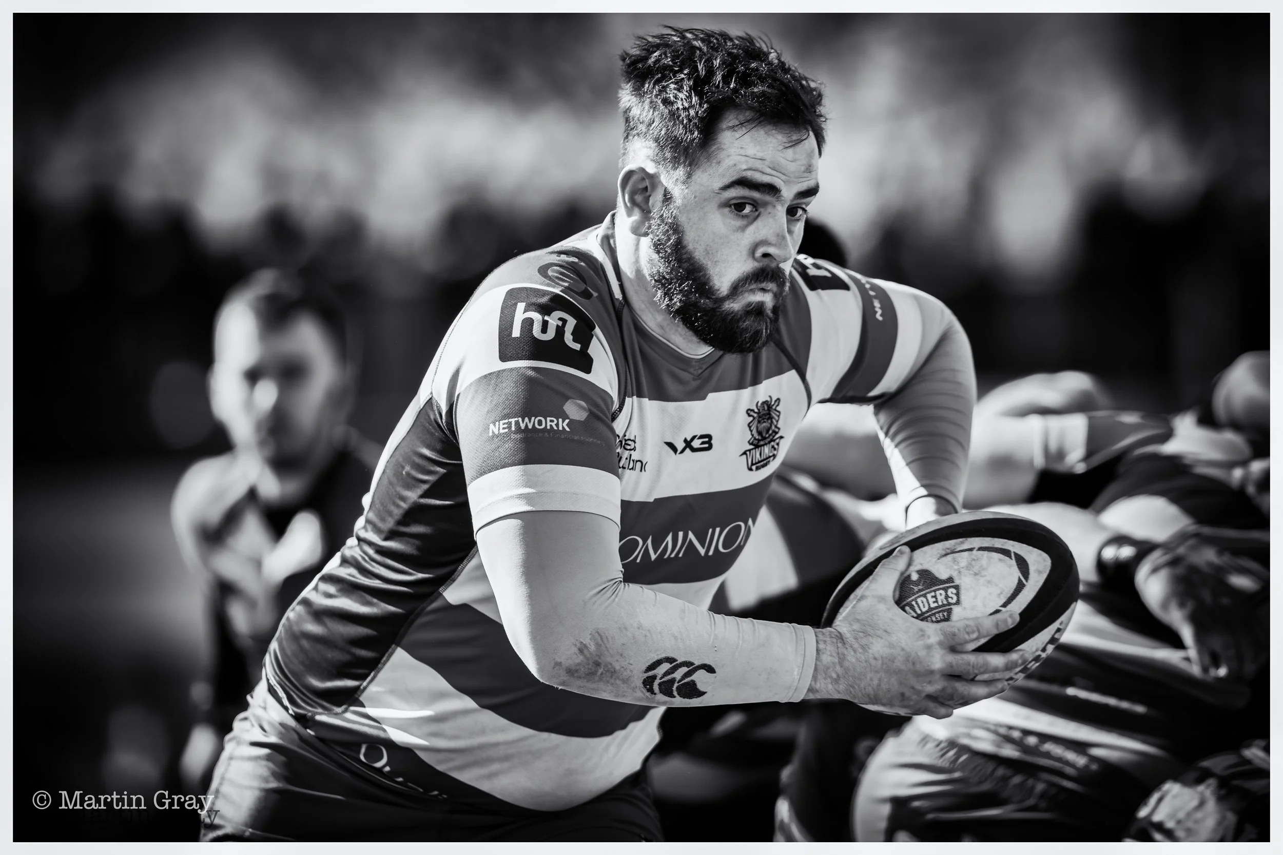 Lucas Barker peels off the back of a scrum B+W-2.jpg