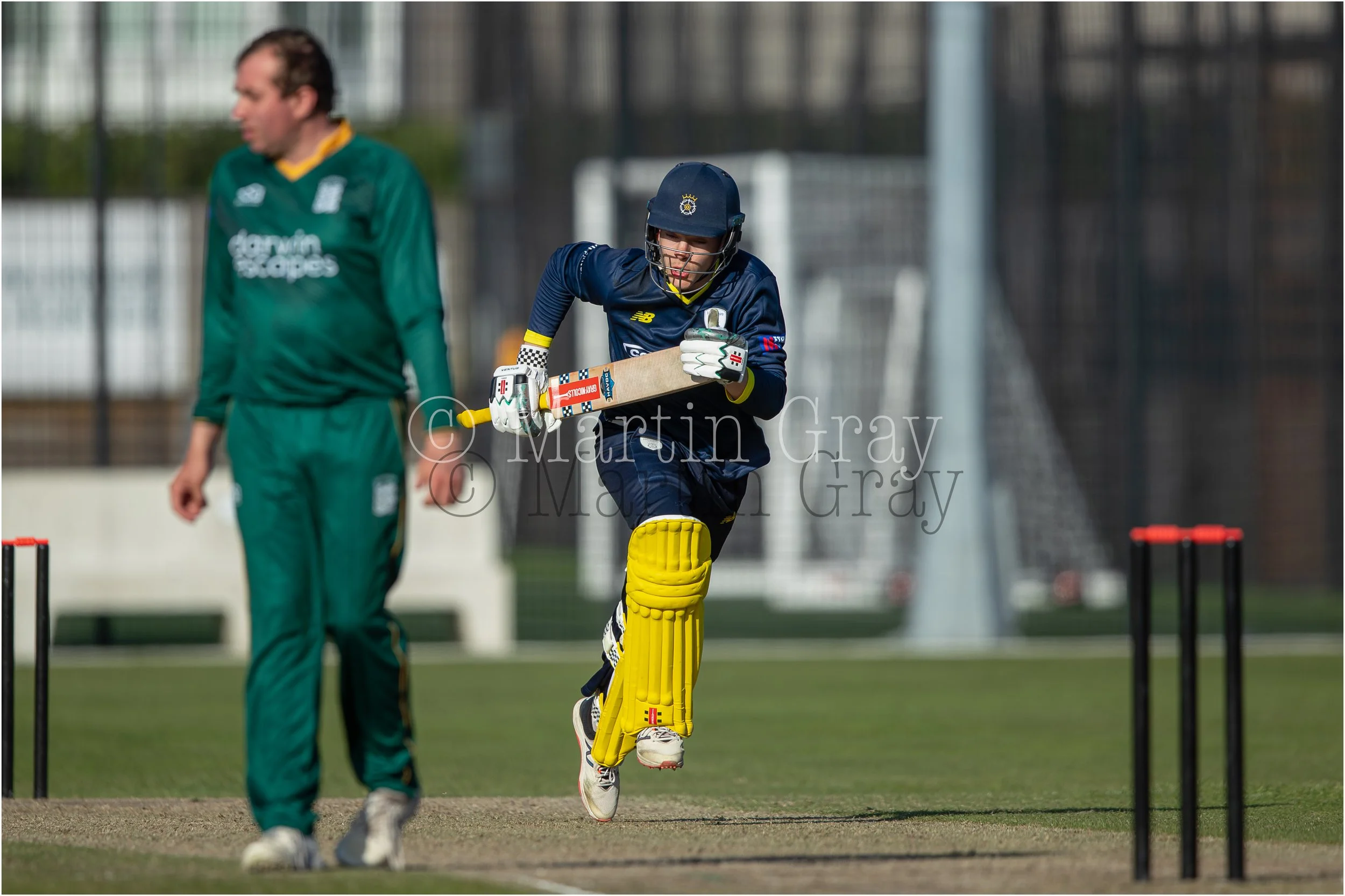 Jensen Mogridge runs a quick single on his way to a fine 78-2932.jpg