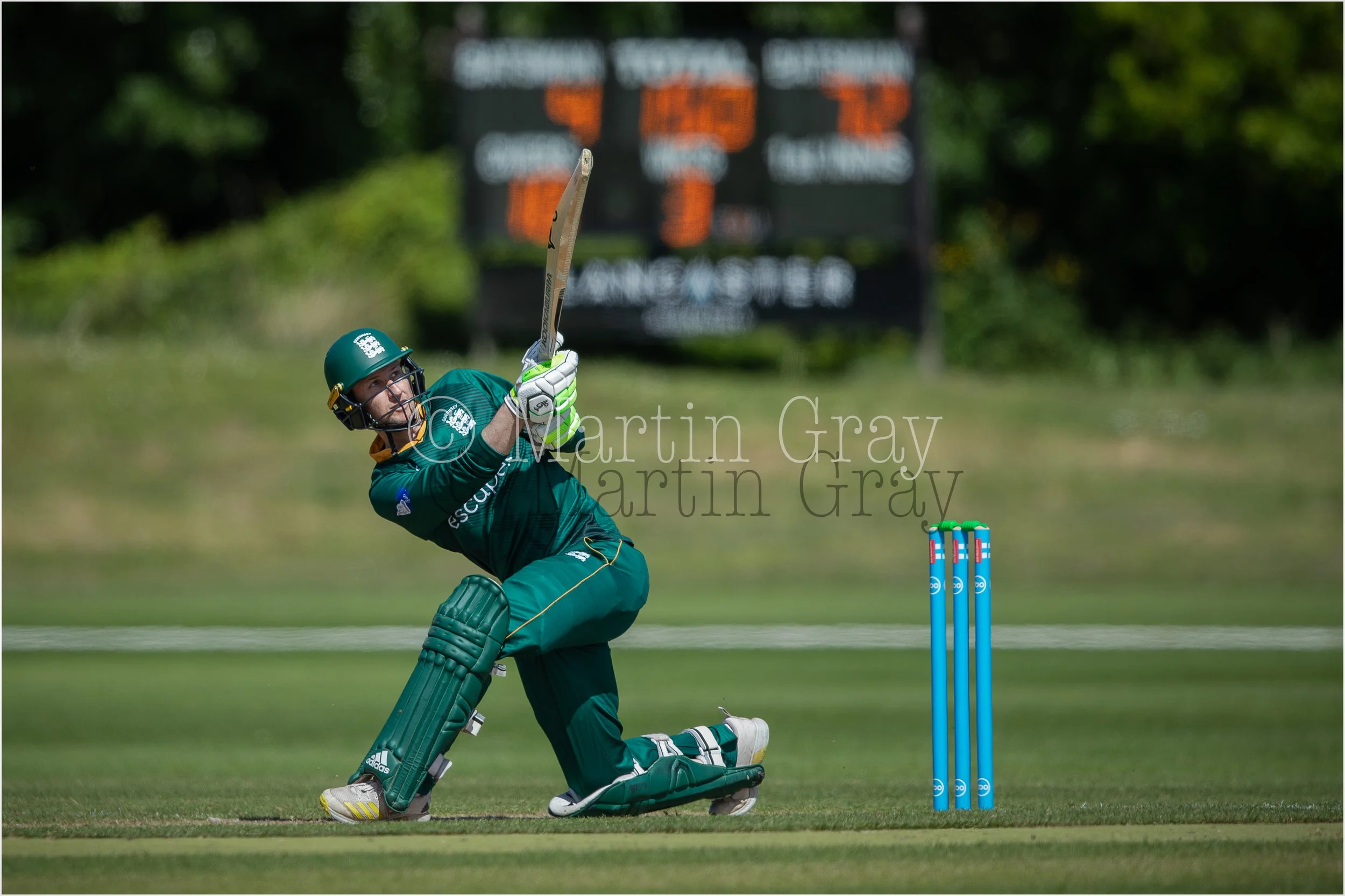Matt Stokes lifts a ball behind square-4224.jpg