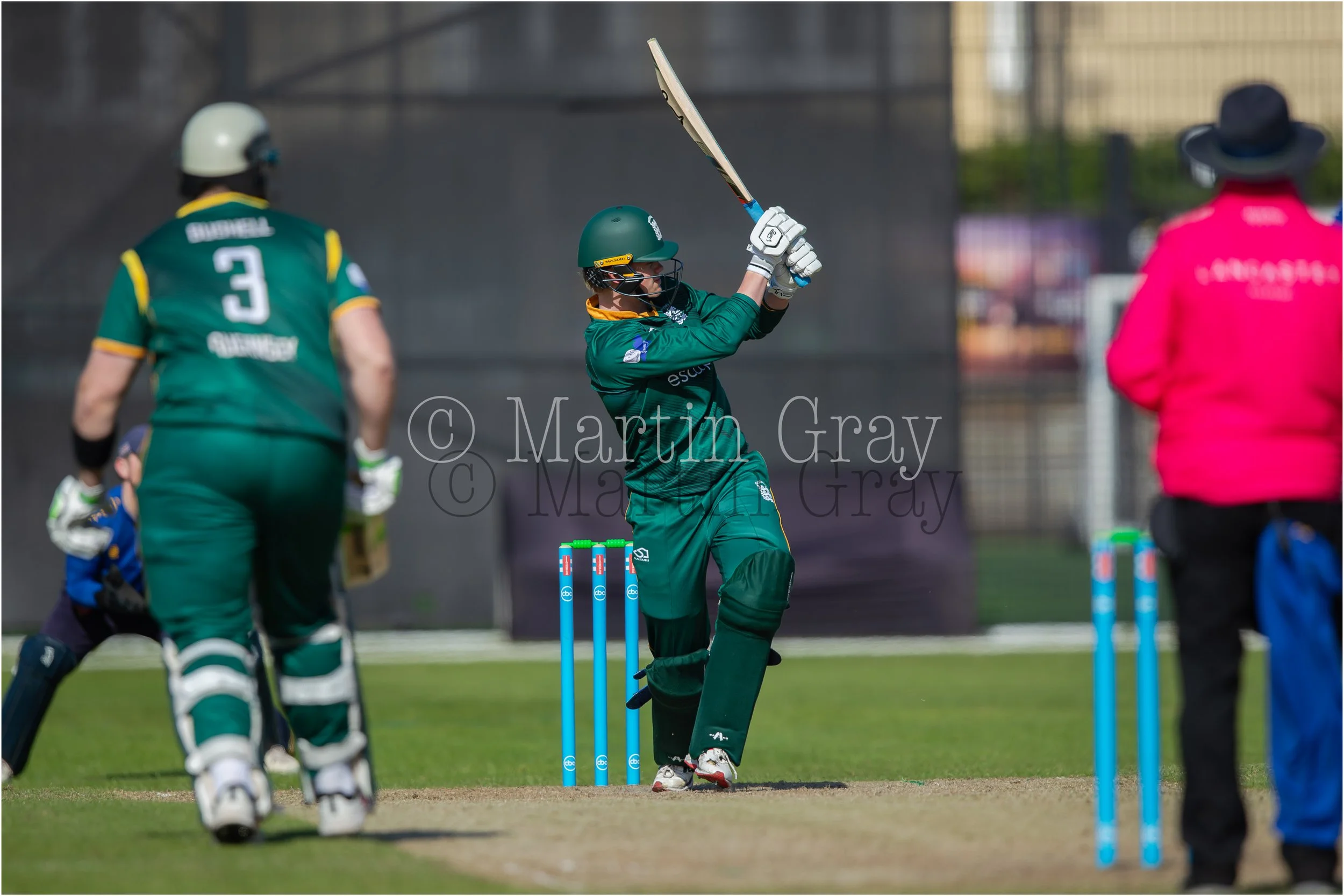 Ed Robinson hoists a legside six-4836.jpg