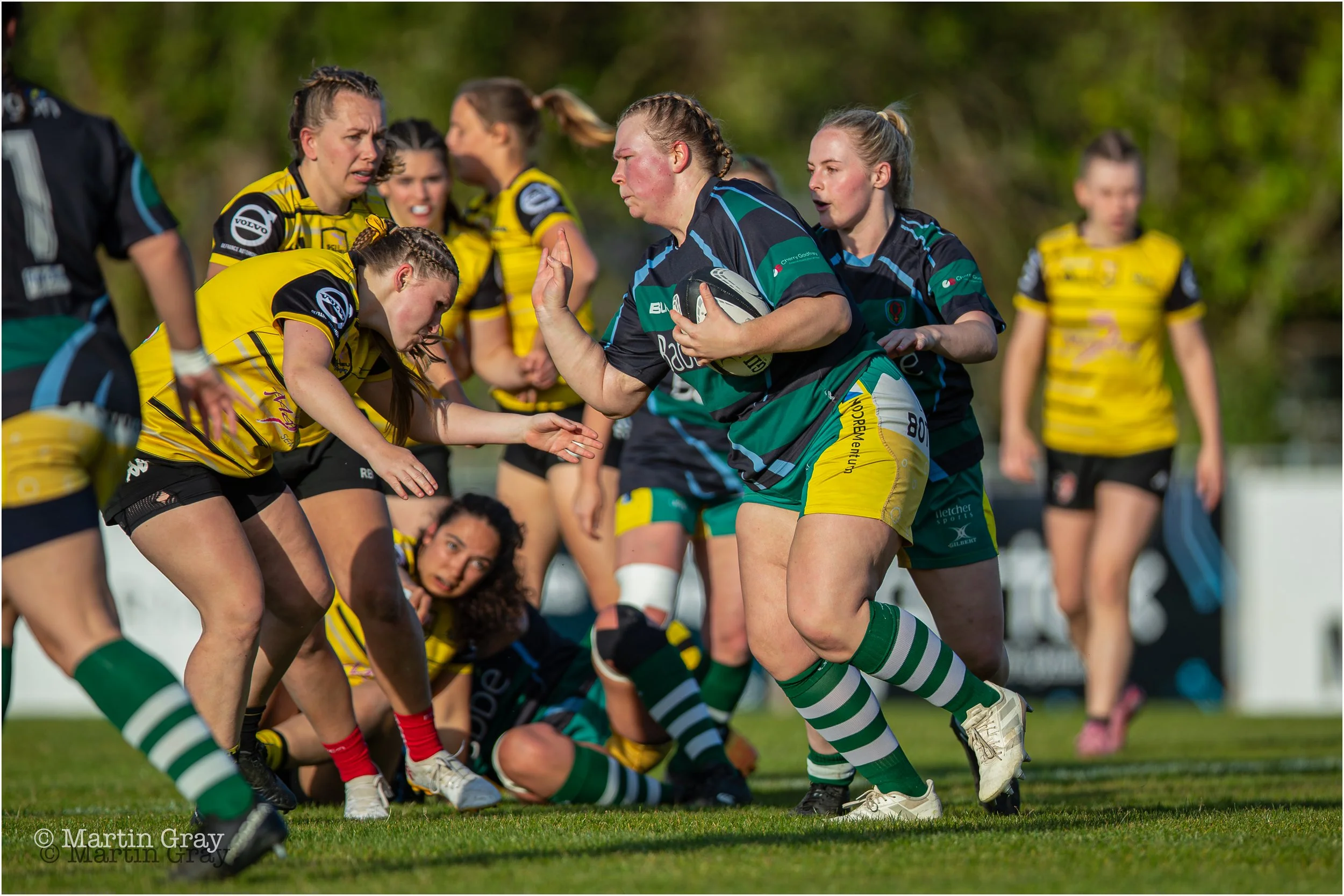Megija Krasovska prepares to hand off an opponent-7677.jpg