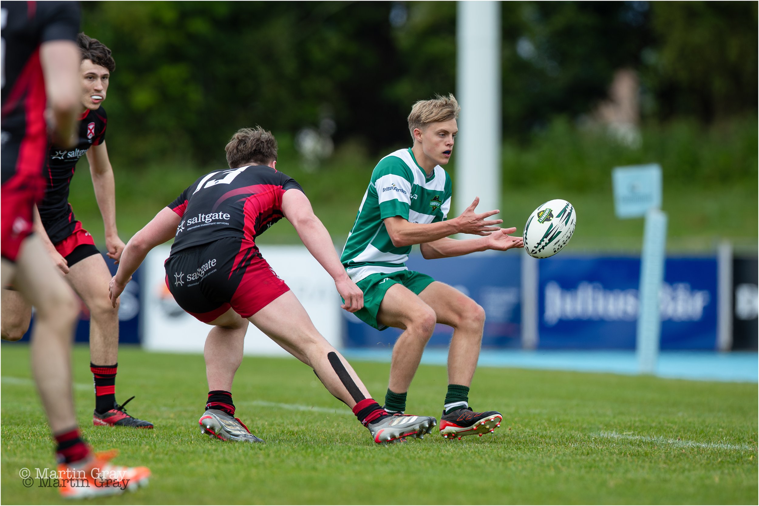 Cam Alexander-Sloman offloads a pass-0563.jpg