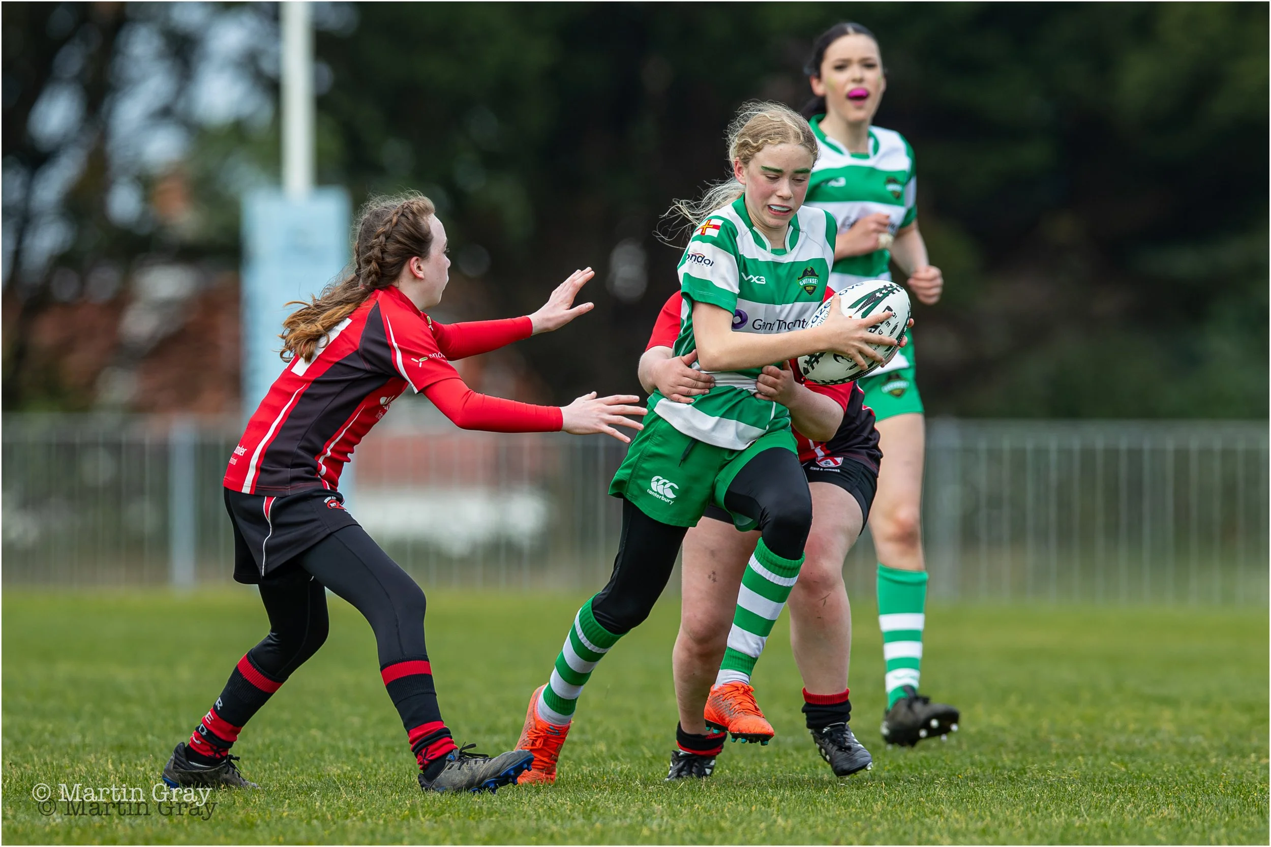 Annabel Grafton break through a jersey tackle-1882.jpg