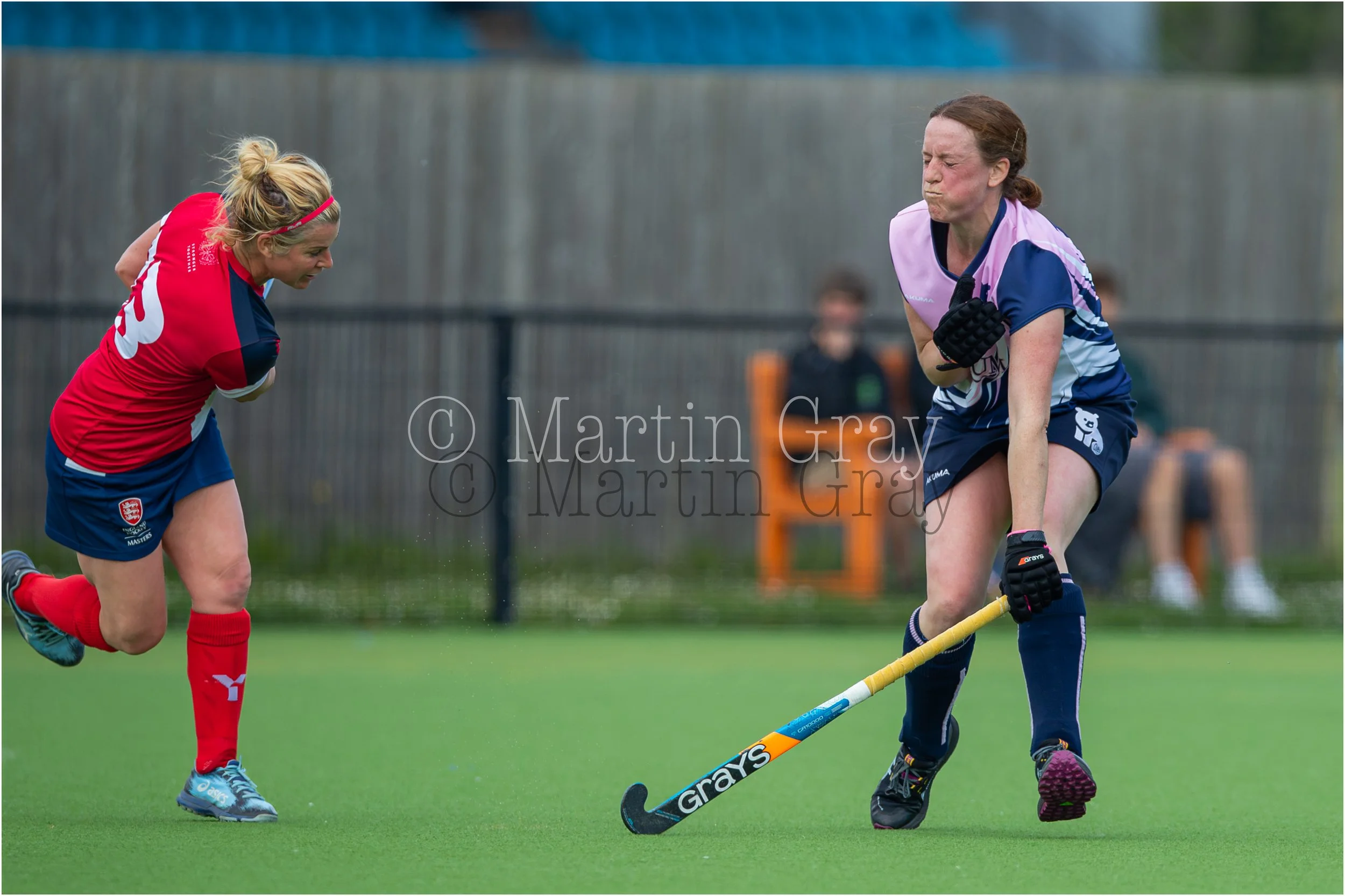 Gemma Underwood taks a hit as Nomads attack-3141.jpg