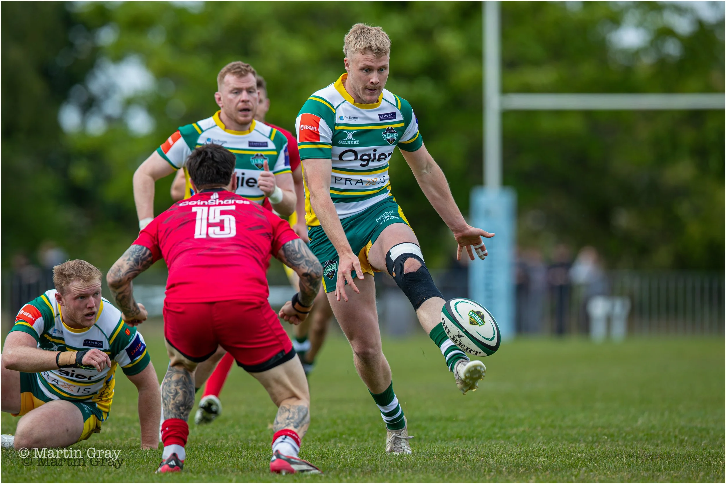 Tom Teasdale punts the ball for territory-5988.jpg