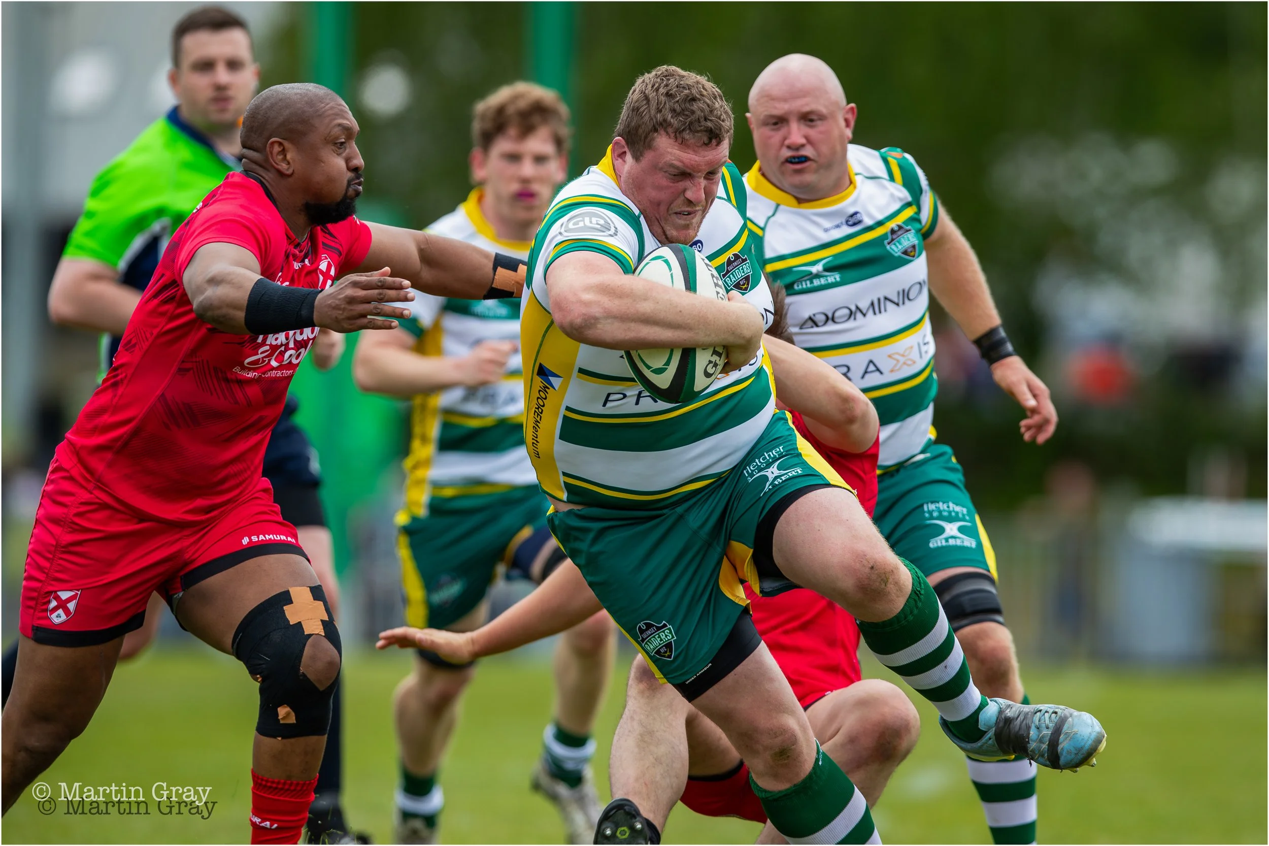 Jacob Smith powers through a tackle-4483.jpg