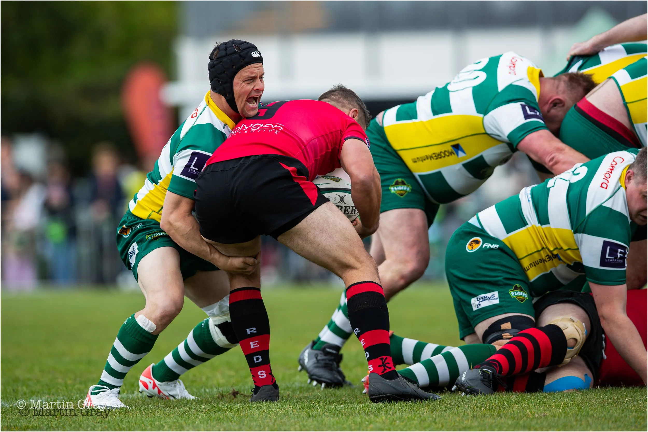 Divon Crouse defends from a scrum-3613.jpg